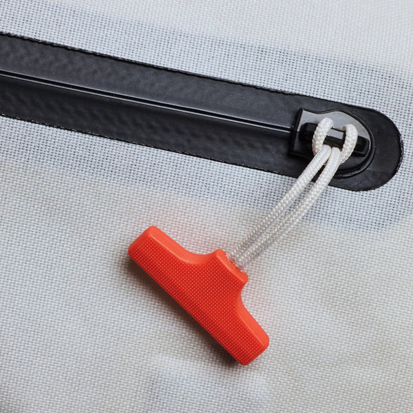 Chrome Industries Kadet WP 9L sling bag – close-up of the waterproof zipper with red pull