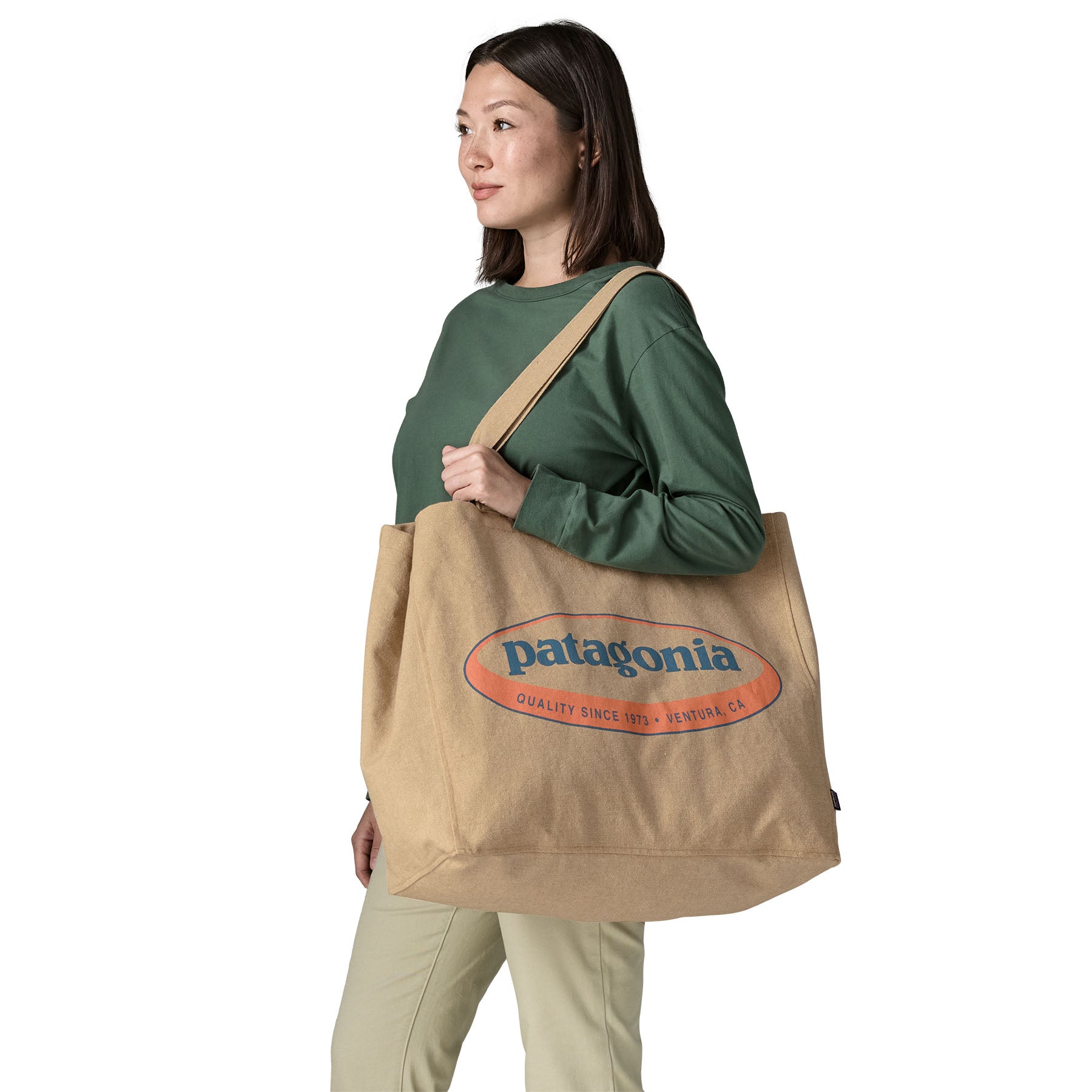 Patagonia Recycled Oversized Tote in '95 Oval Logo: Classic Tan — lifestyle