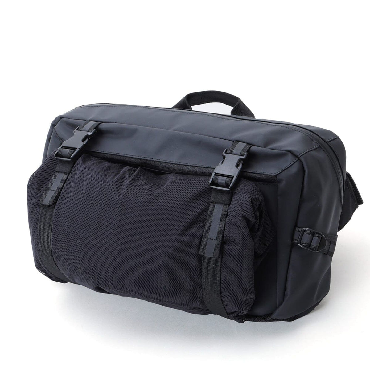 Chrome Industries Kadet Max Sling Bag 15L in Black Tarp — angle view 3