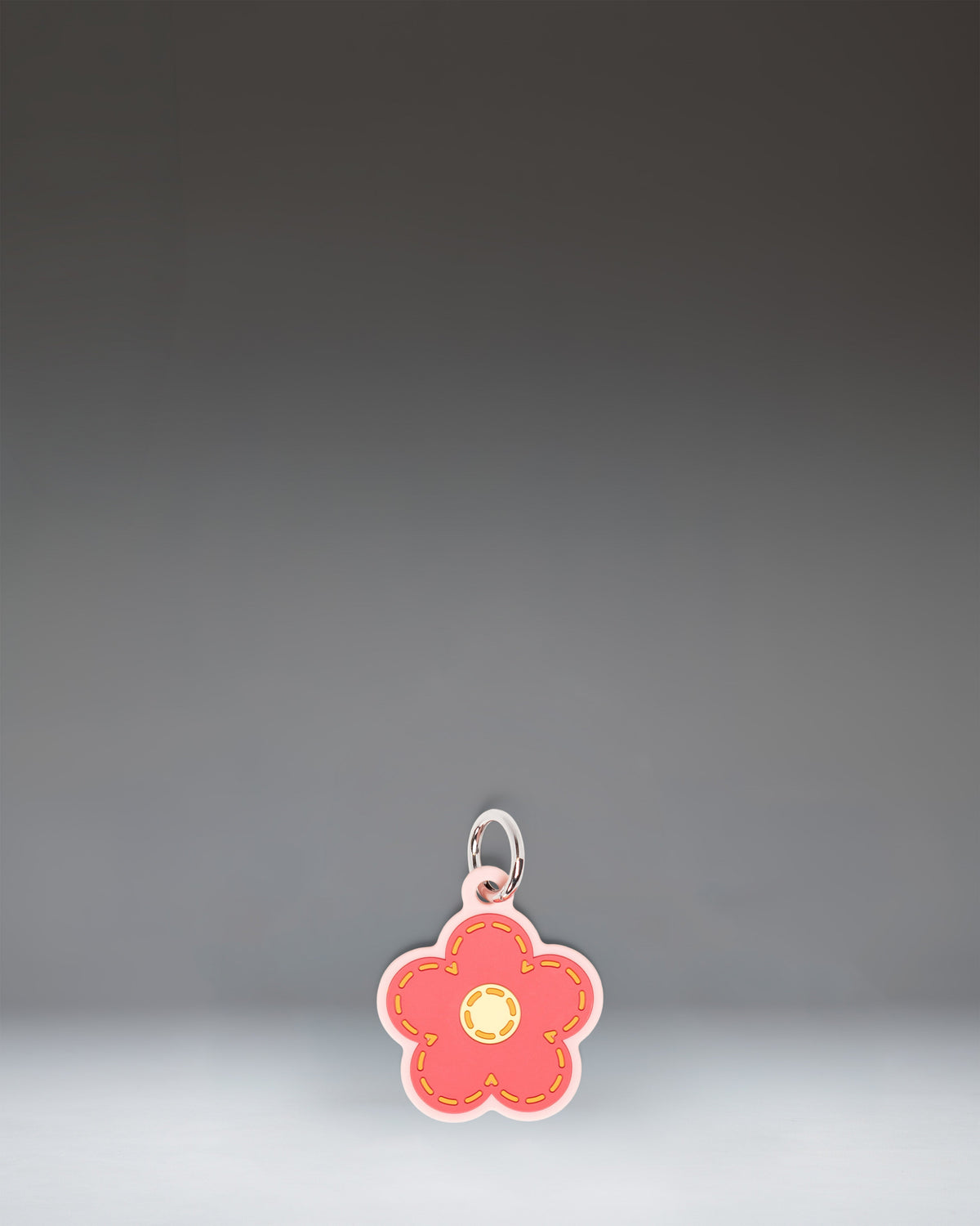 Herschel Daisy Bag Charm in Pink Daisy — front view