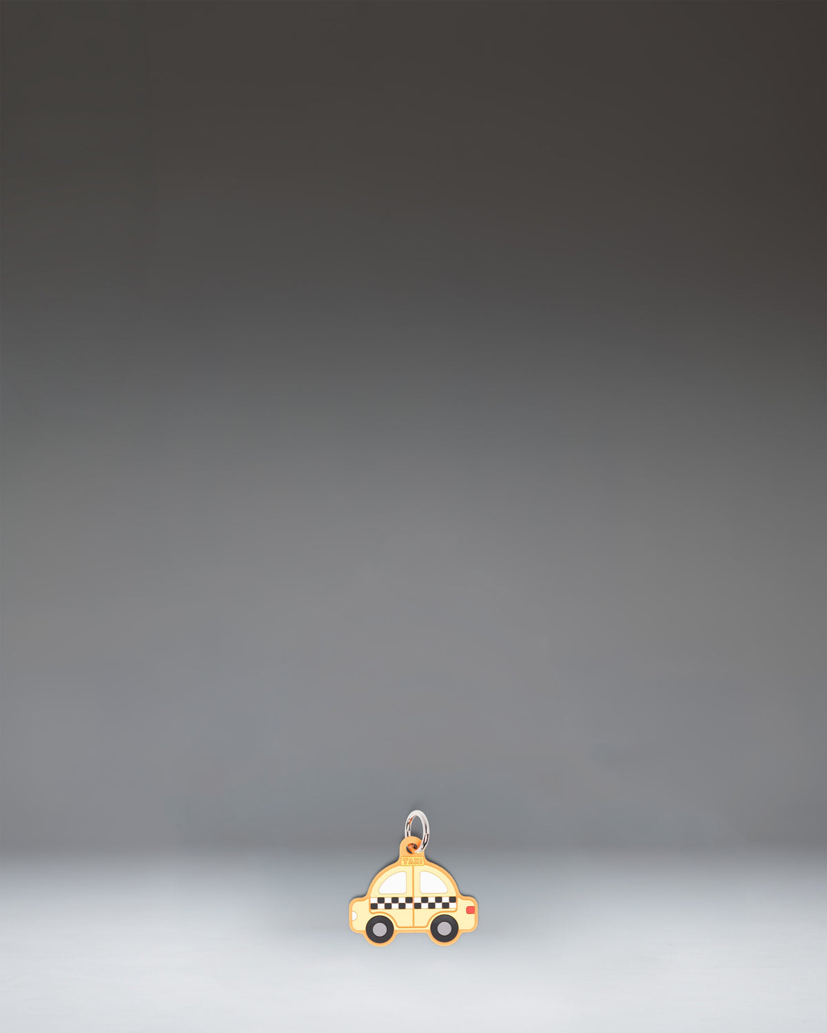 Herschel Taxi Bag Charm in Taxi — front view