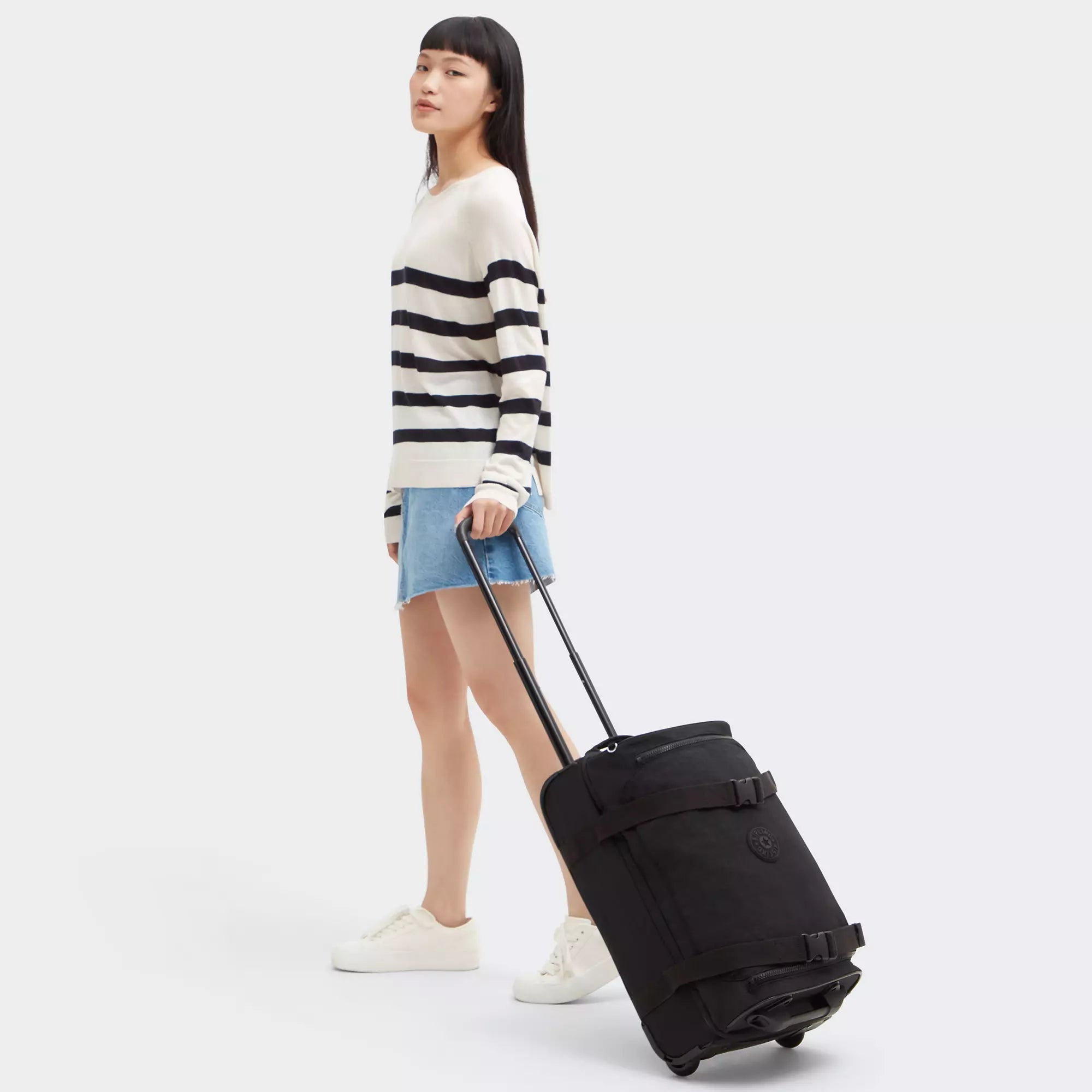 Kipling Aviana Small Rolling Carry-On Luggage in Black Noir — lifestyle # color_Black Noir