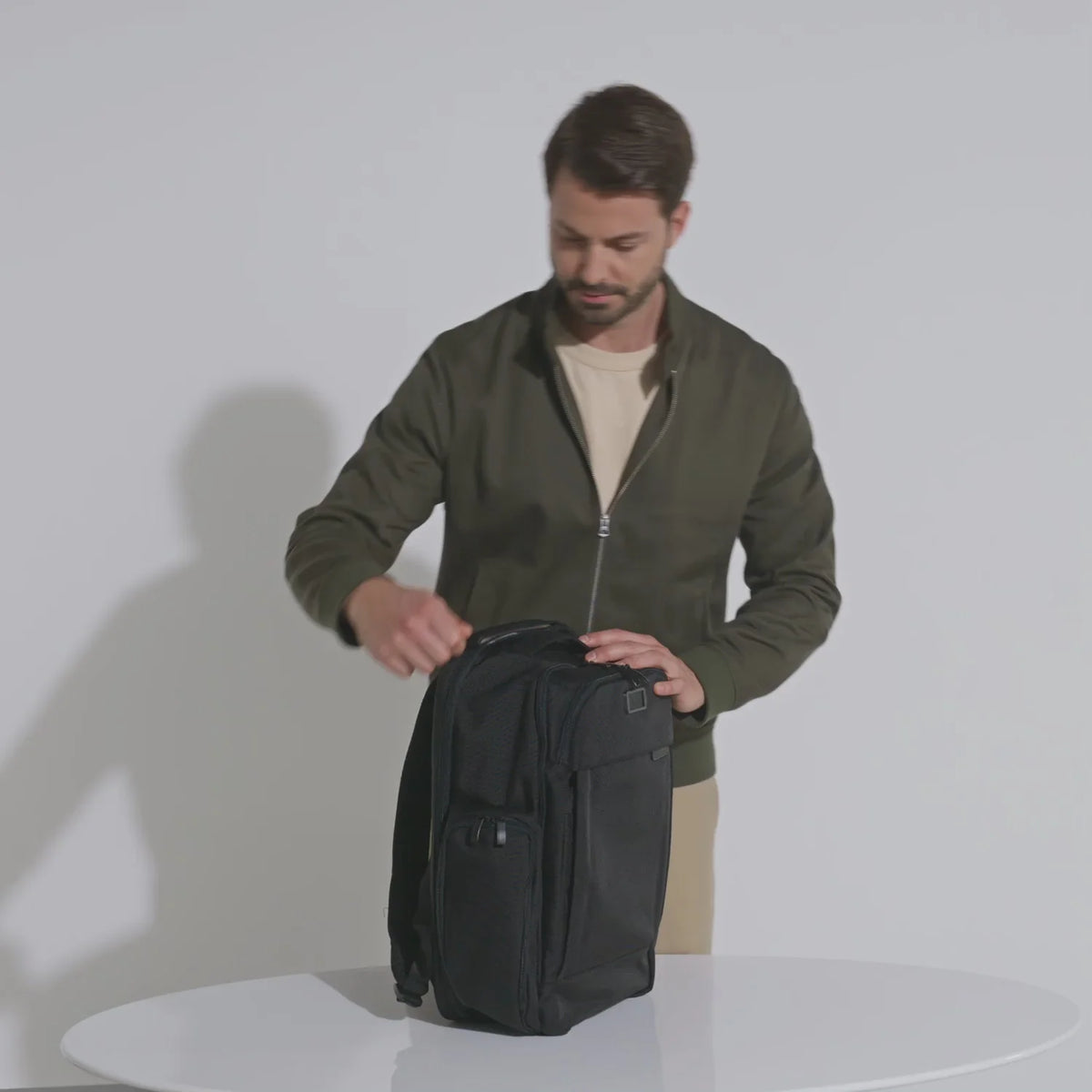 Briggs & Riley Baseline Traveler Backpack in Black — lifestyle