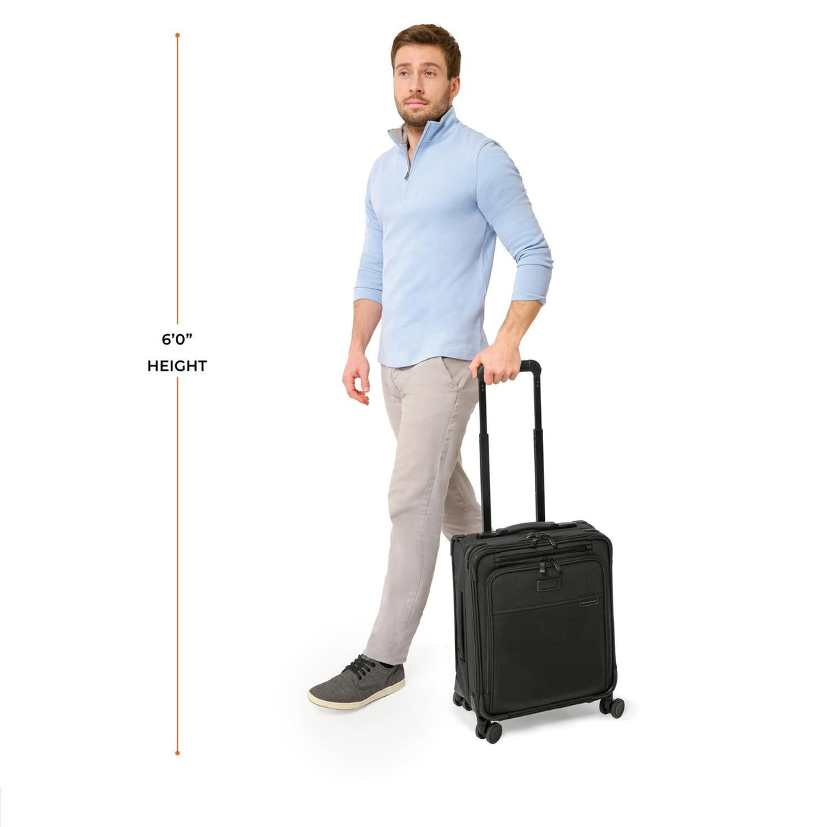 Briggs & Riley Baseline Compact 19" Carry-On Expandable Spinner in Black — lifestyle