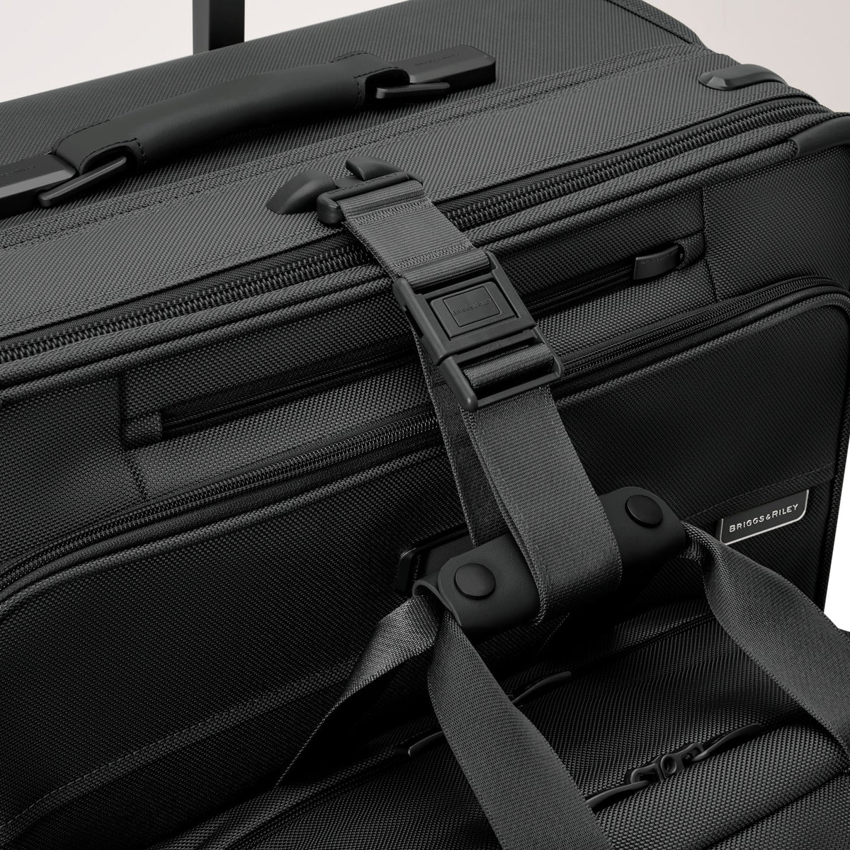 Briggs & Riley Baseline Compact 19" Carry-On Expandable Spinner in Black — detail view 6