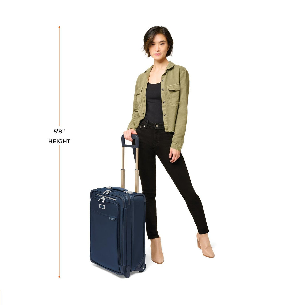Briggs & Riley Baseline Essential 22" 2-Wheel Expandable Carry-On in Navy — lifestyle