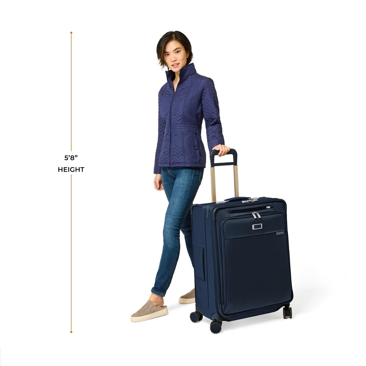 Briggs & Riley Baseline Medium Expandable Spinner in Navy — lifestyle