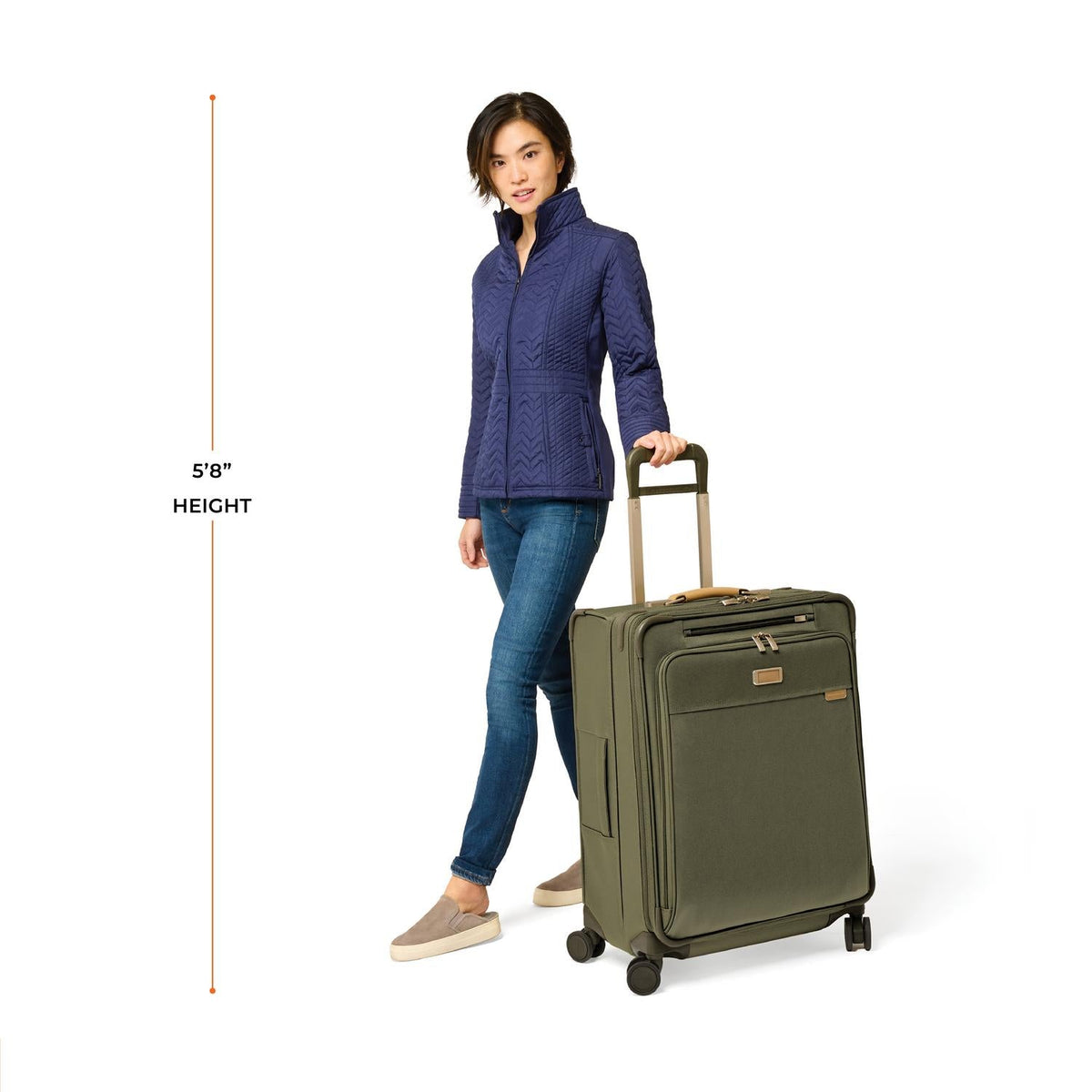 Briggs & Riley Baseline Medium Expandable Spinner in Olive — lifestyle