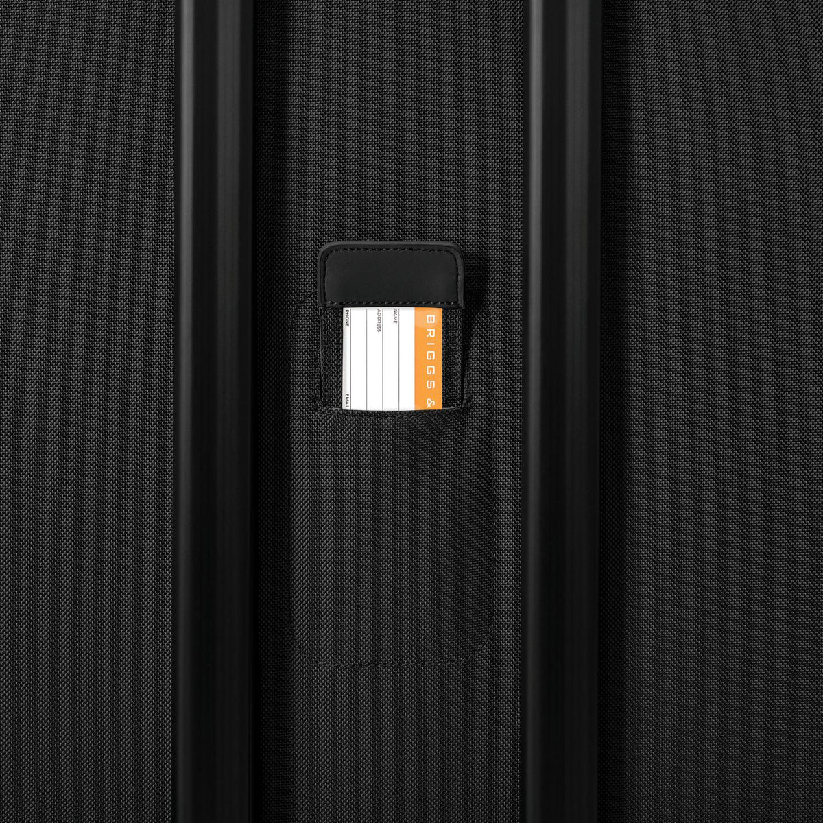 Briggs & Riley Baseline Large Expandable Spinner in Black — detail view