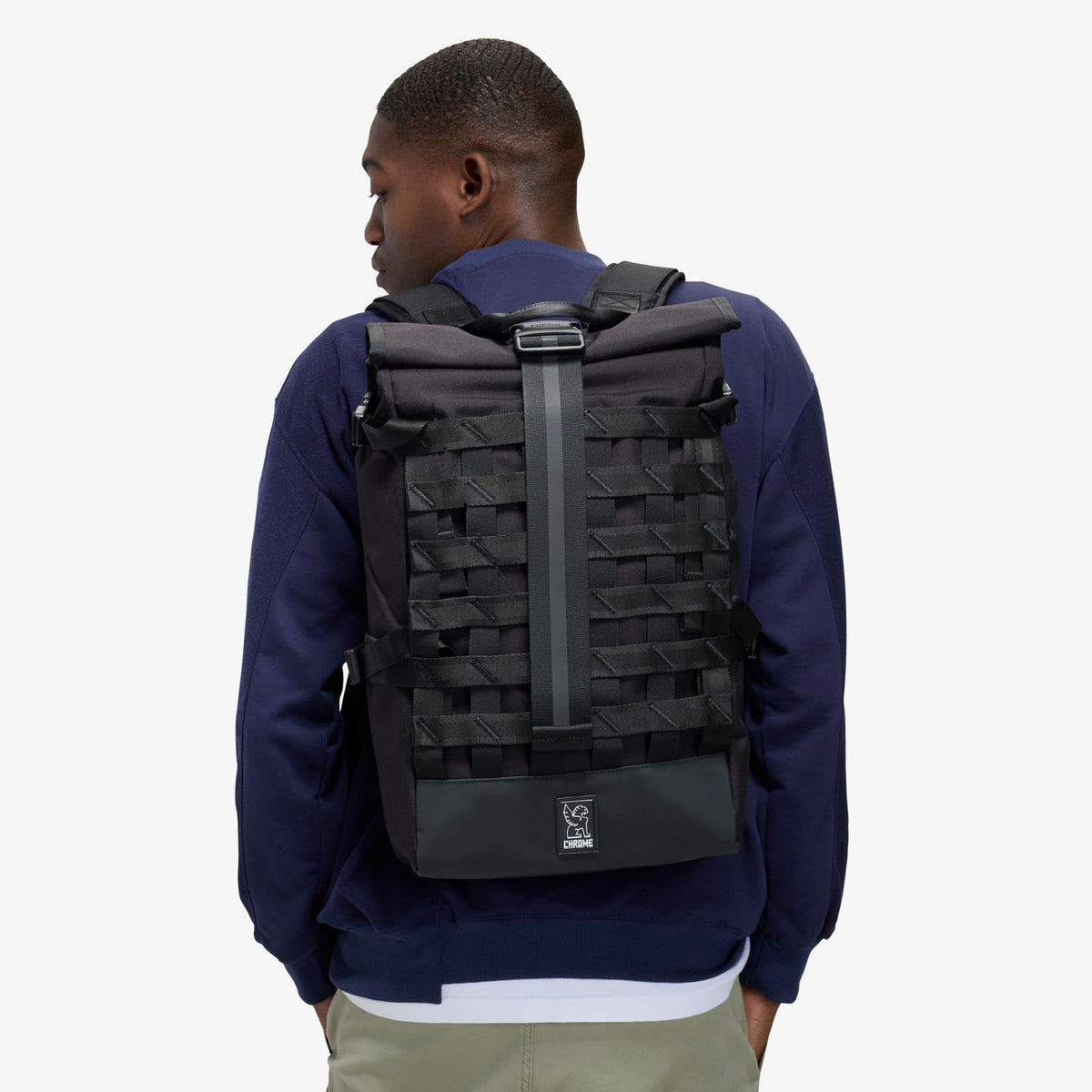 Chrome Industries Barrage Pack 22L in Black — lifestyle 3
