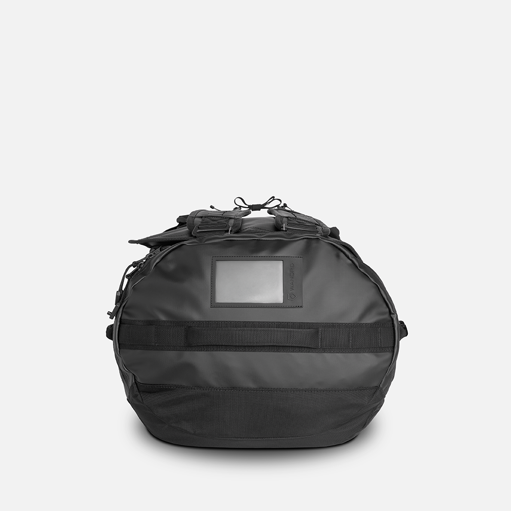 WANDRD CARRYALL Duffel 60L in Black — angle view 3