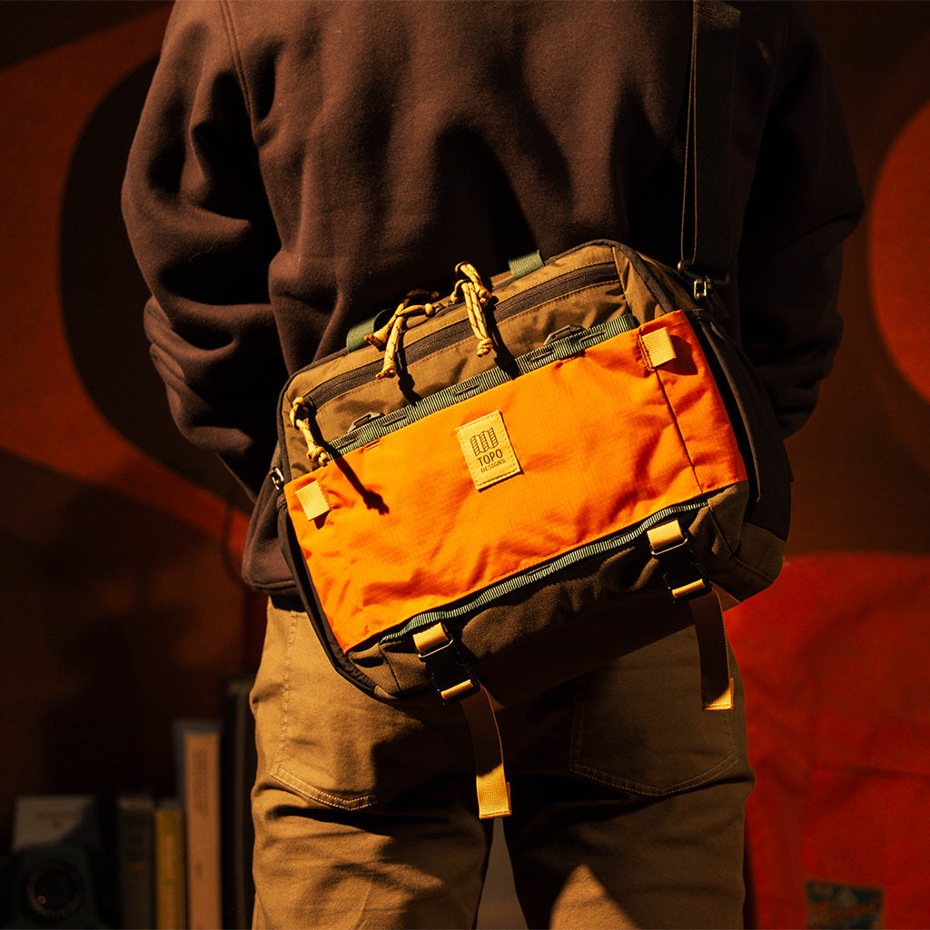 Topo Designs Mountain Cross Bag in Woodland Terracotta — lifestyle 2 # color_Woodland Terracotta