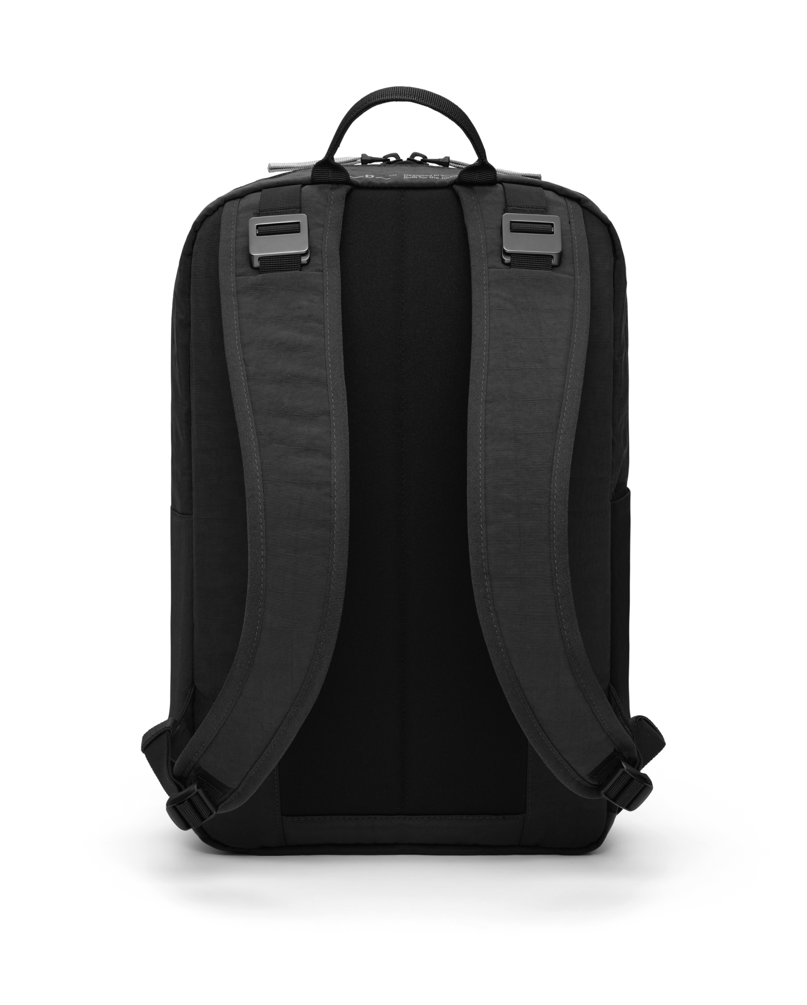 Db Journey Daypack 17L in Charcoal Grey — back view # color_Charcoal Grey