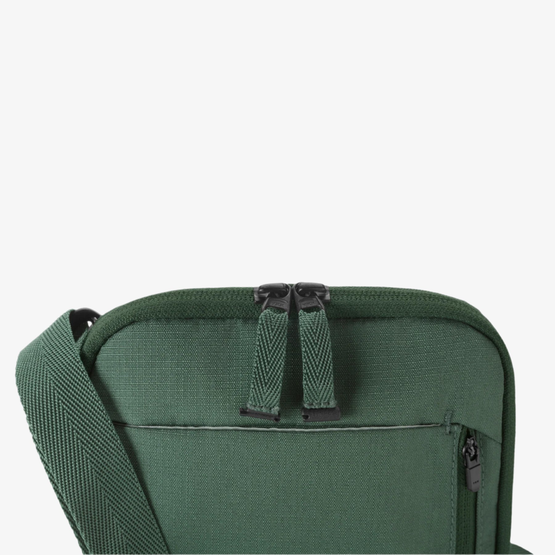 Eagle Creek Stash RFID Crossbody Bag in Grass Green — detail view