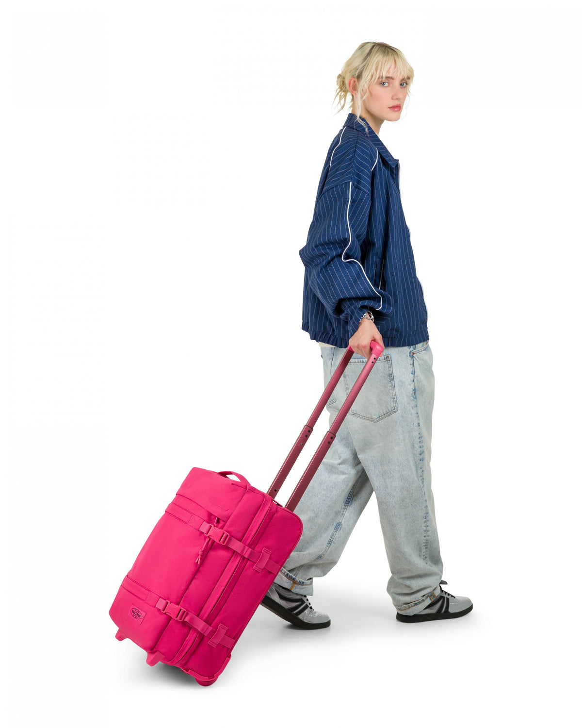 Eastpak Transit'R Small Carry-On 2-Wheel Duffel  | 42L in Monotone Pink — lifestyle