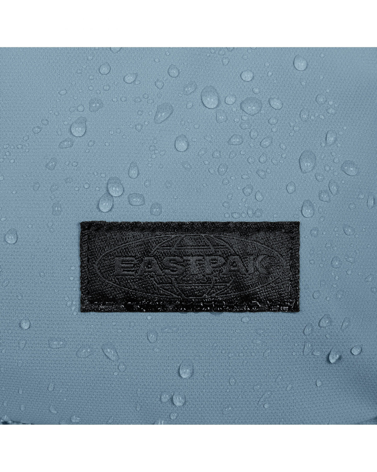 Eastpak Travelpack Backpack Tarp Edition 42L in Tarp Dust Blue — angle view 3