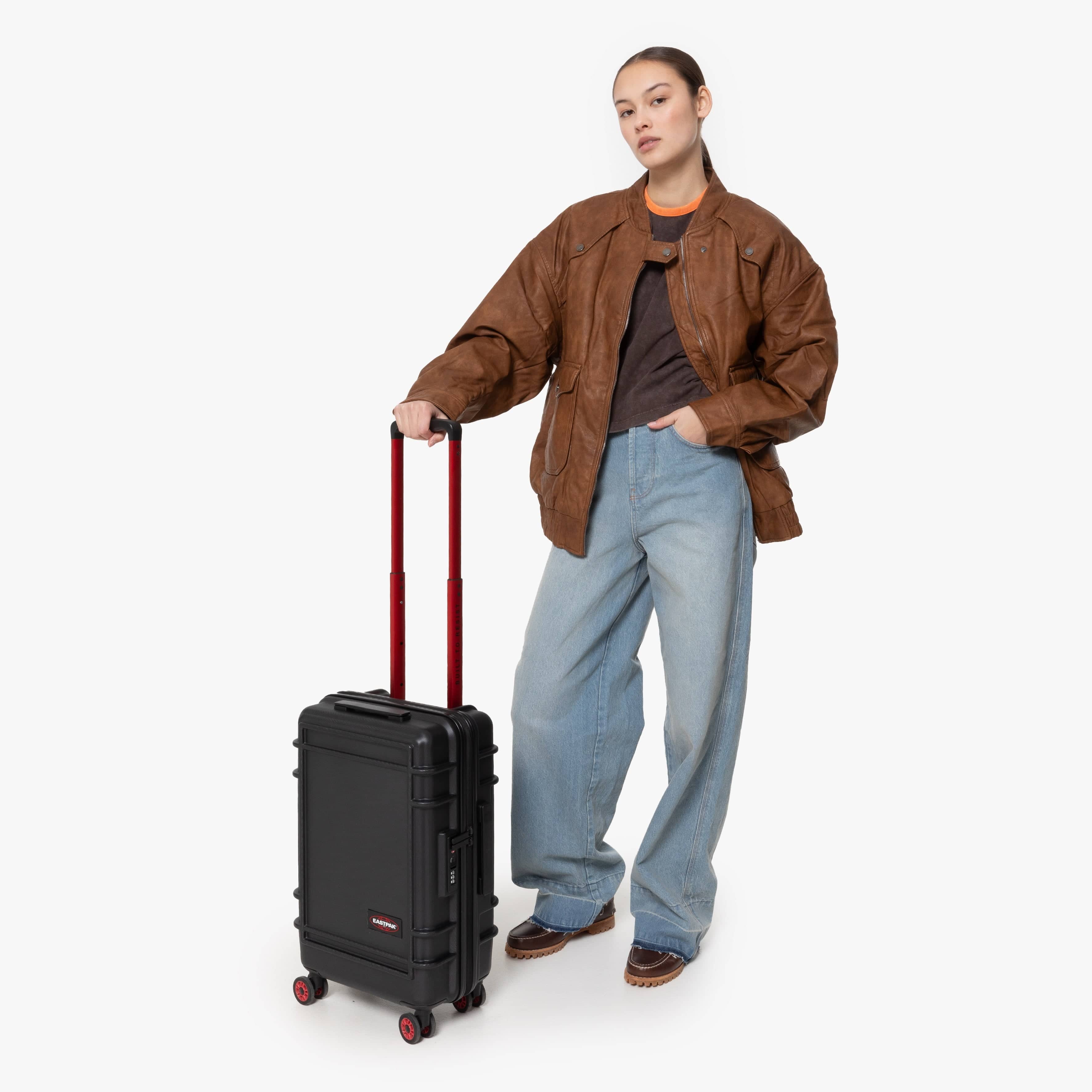 Eastpak Resist'R Zip Cabin Hardside Spinner | 28L in Black — lifestyle # color_Black