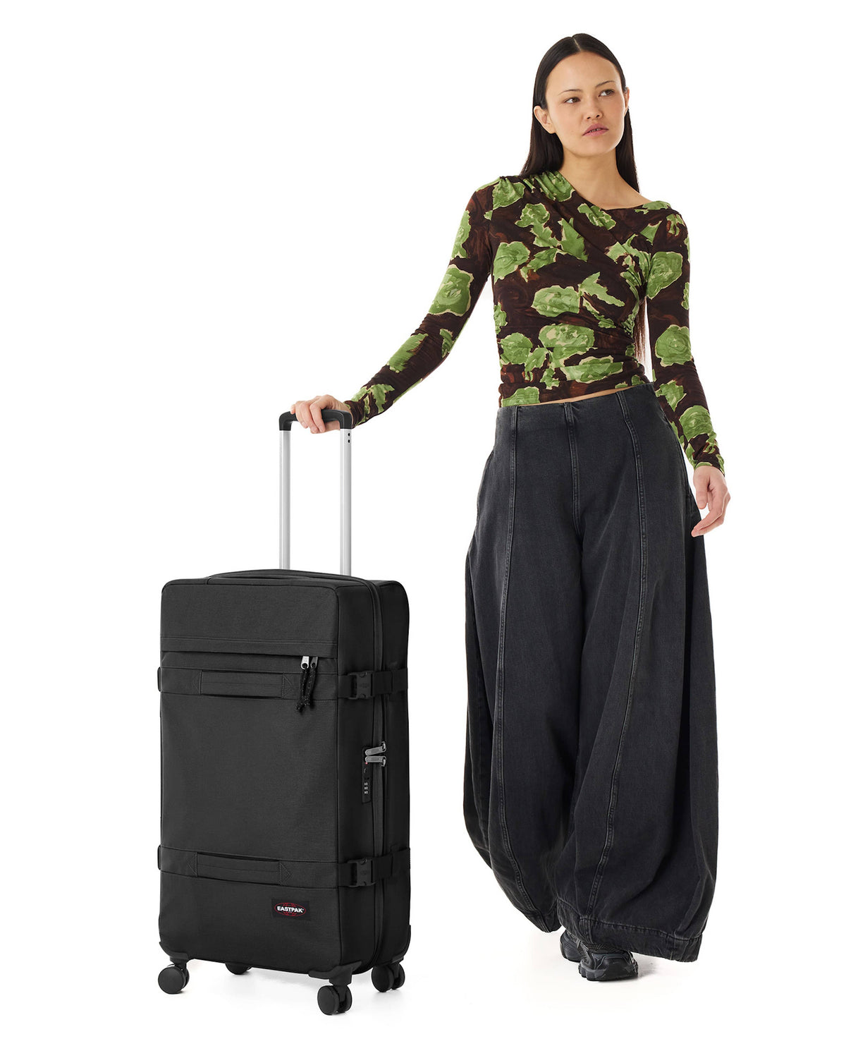 EastPak Transit'R 4 Large Spinner Luggage  | 80 L in Black — lifestyle