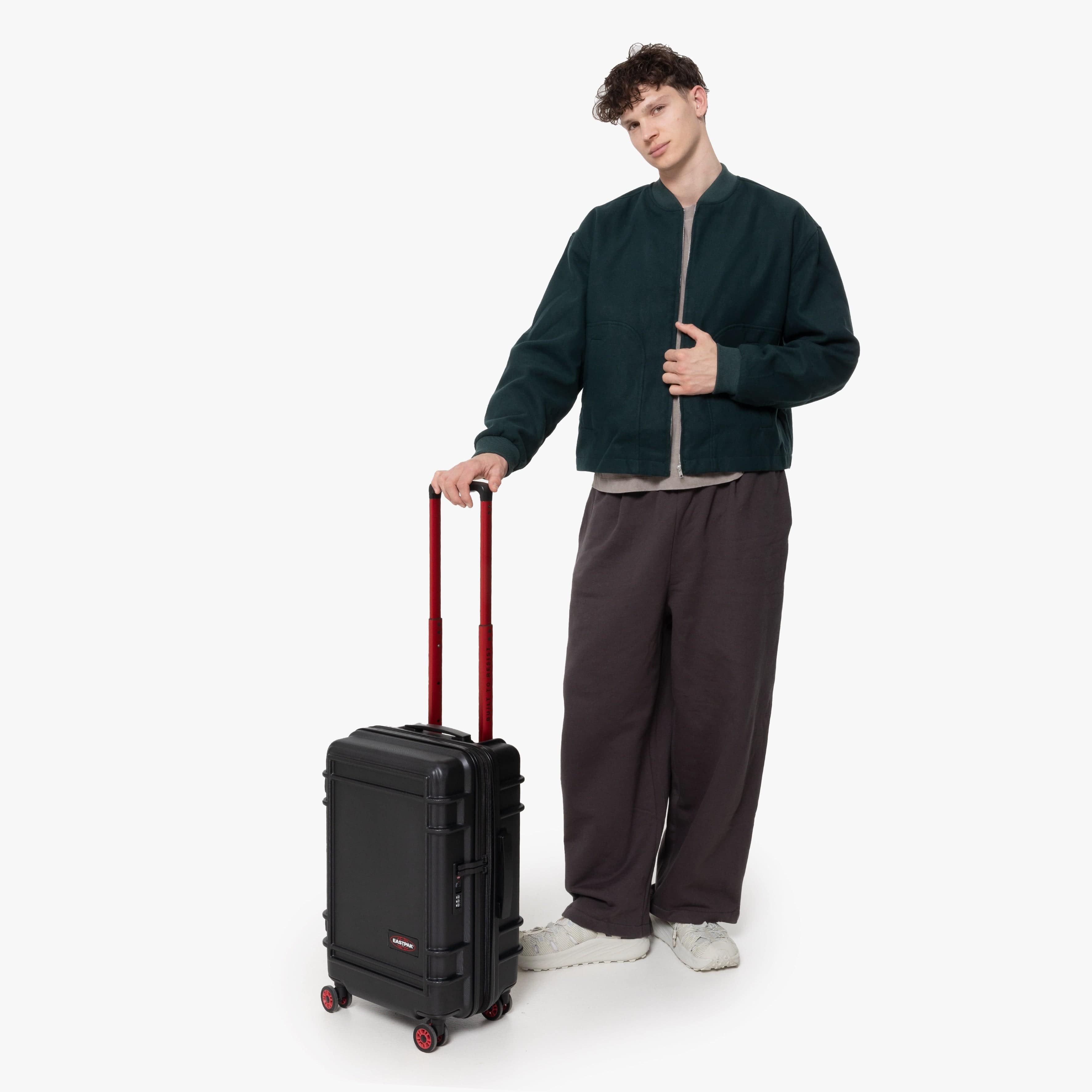 Eastpak Resist'R Zip Small Hardside Spinner | 34L in Black — lifestyle # color_Black