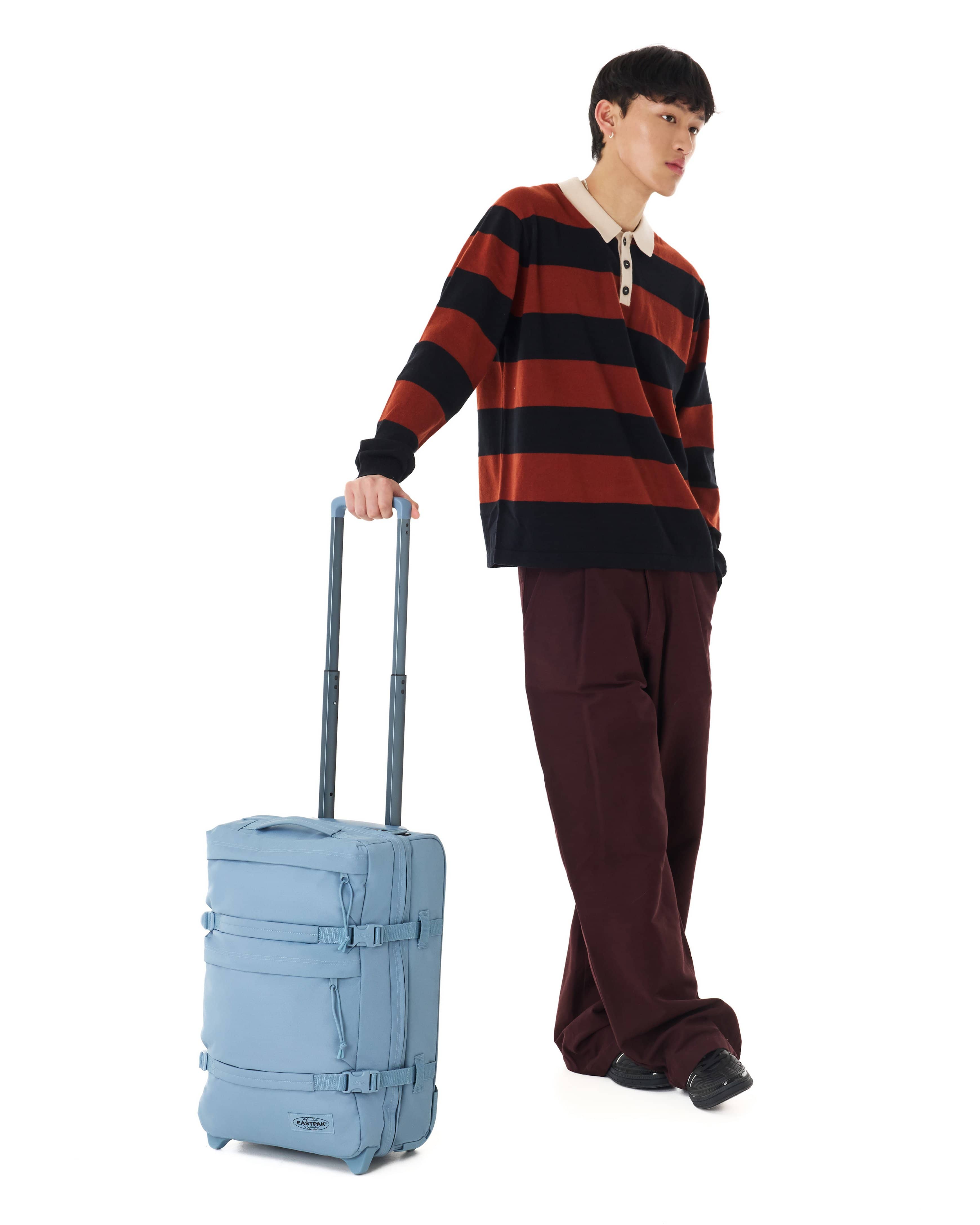 Eastpak Transit'R Plus Small 2-Wheel Carry-On | 38L in Monotone Blue — lifestyle # color_Monotone Blue