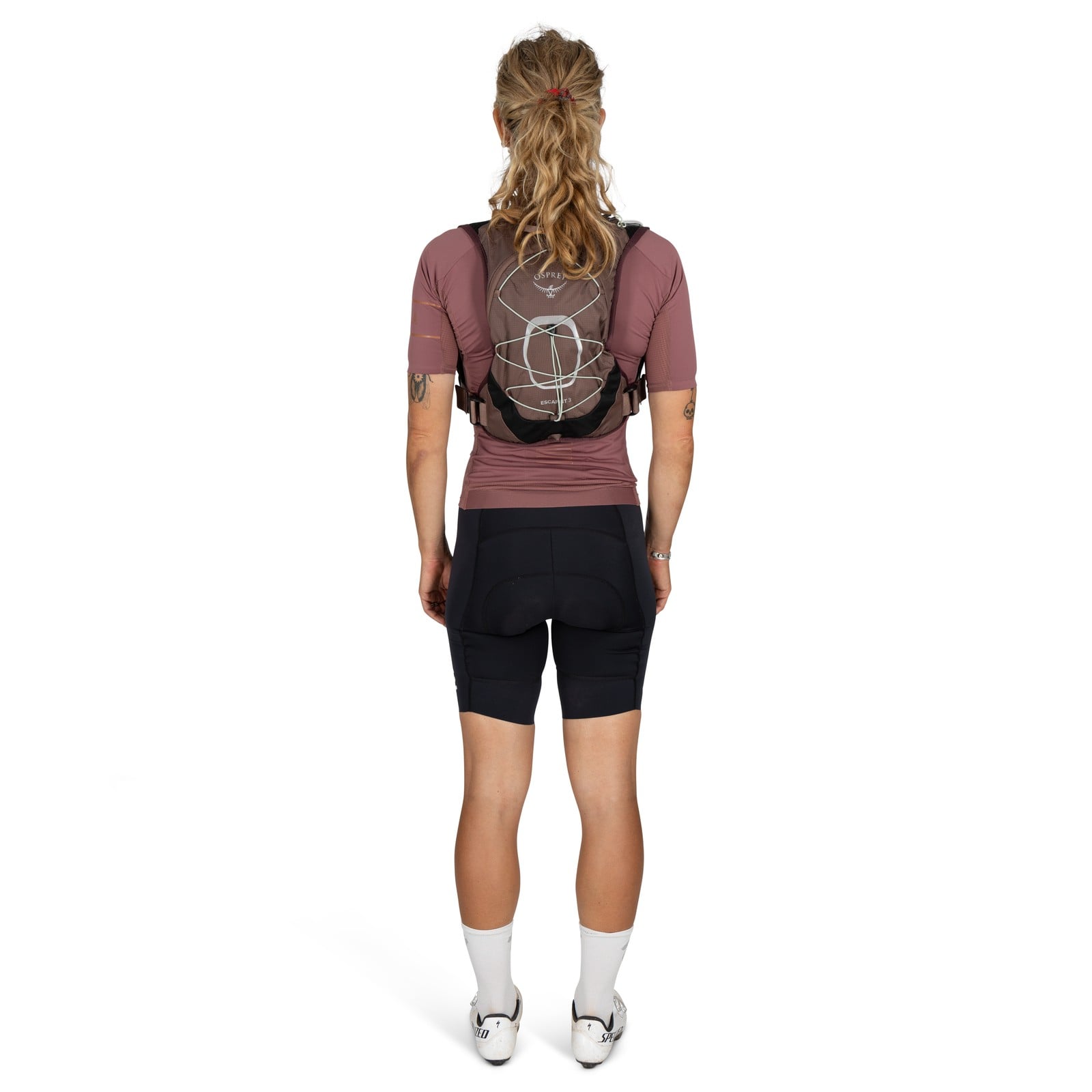 Osprey Escapist Velocity 3 Bike Hydration Vest 3L in Magma Brown — lifestyle 3