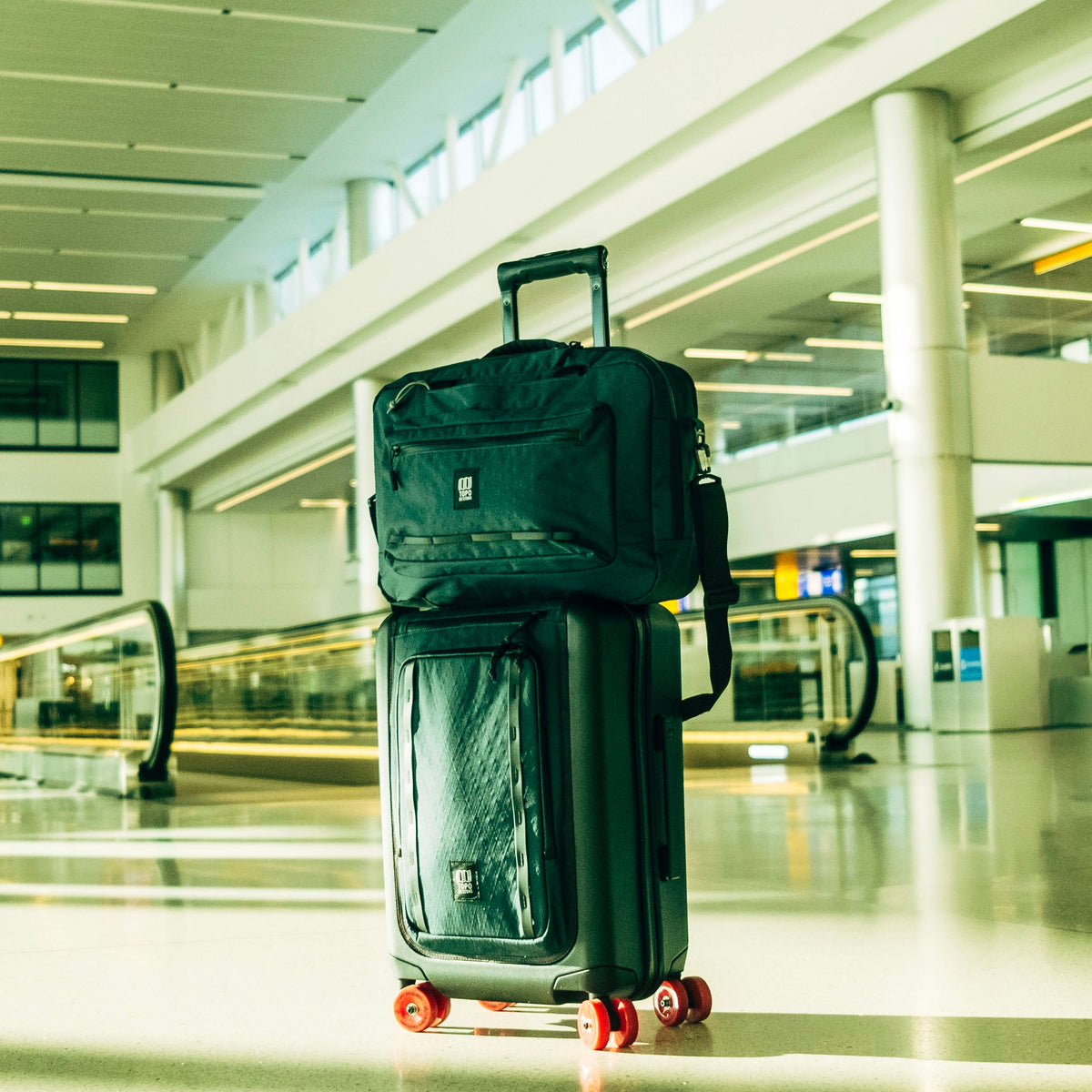Topo Designs Global Pro Travel Roller Bag — lifestyle