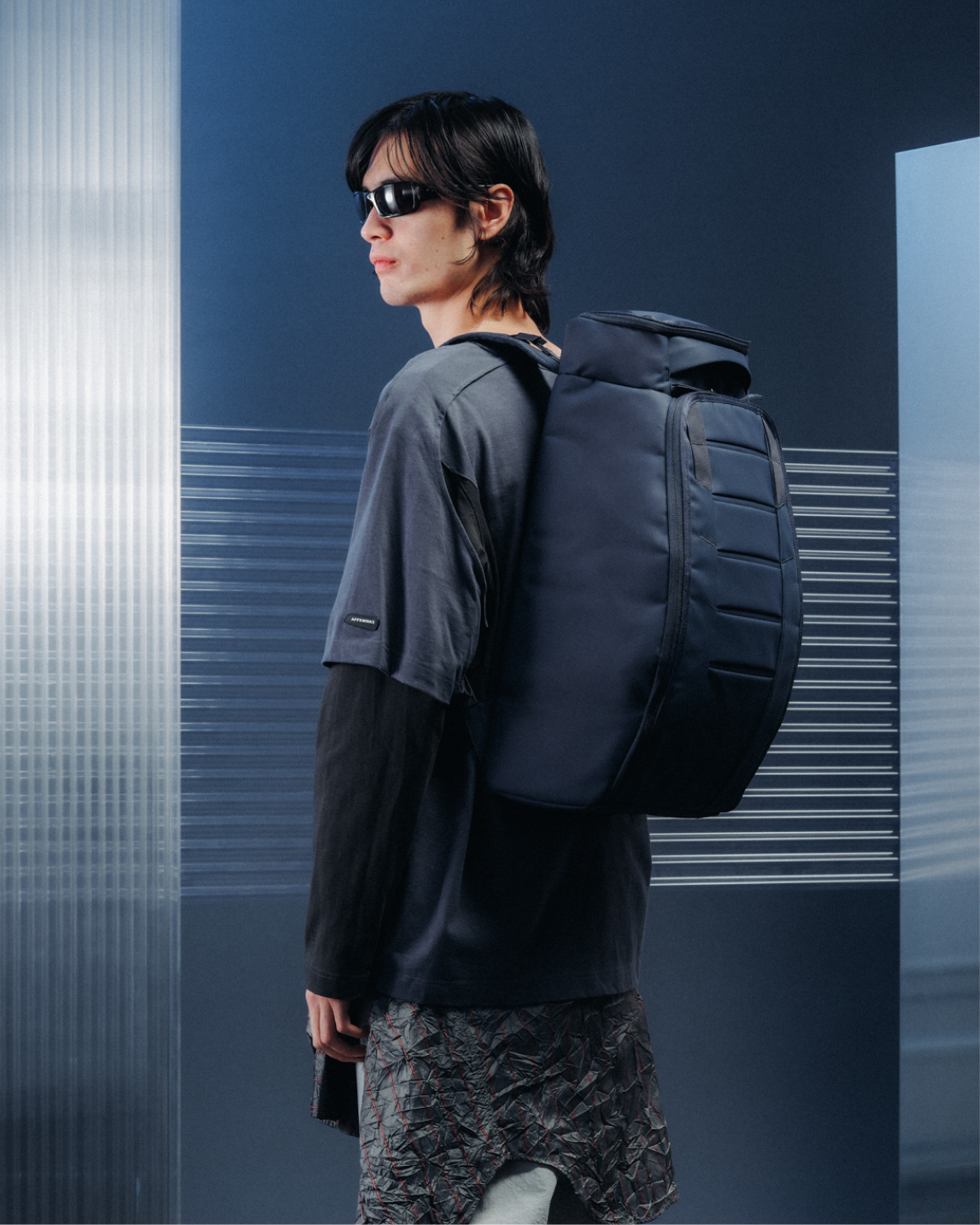 Db Journey Hugger Backpack 30L in Blue Hour — lifestyle # color_Blue Hour