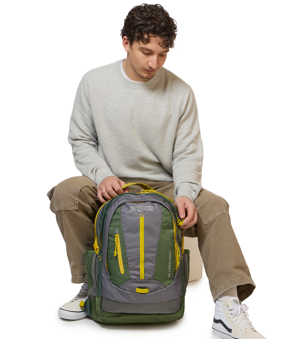 JanSport Odyssey Backpack in Cargo Green — lifestyle # color_Cargo Green