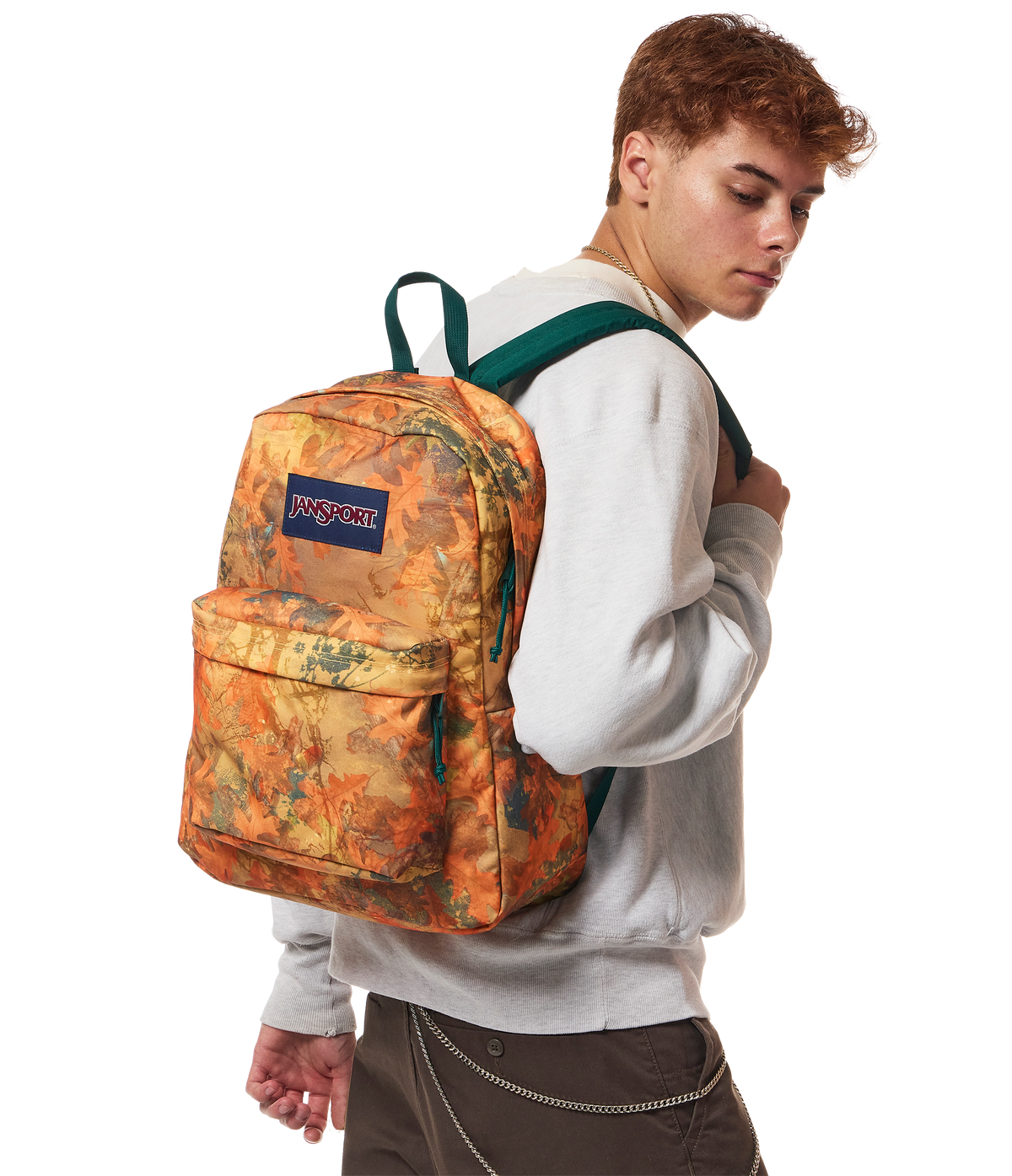JanSport SuperBreak Plus Iconic Style in Bogcore Camo Orange — lifestyle