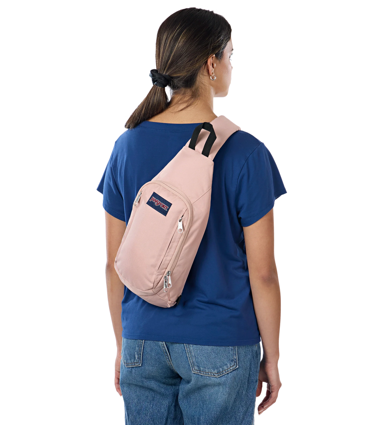 JanSport Move Sling Bag in Misty Rose — lifestyle