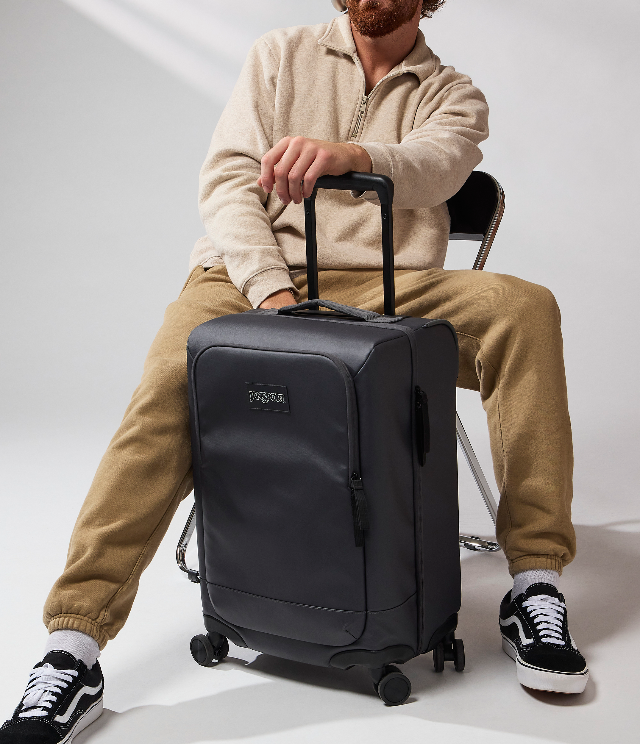 JanSport Good Latitude 22" Carry On in Smokey Grit — angle view 2