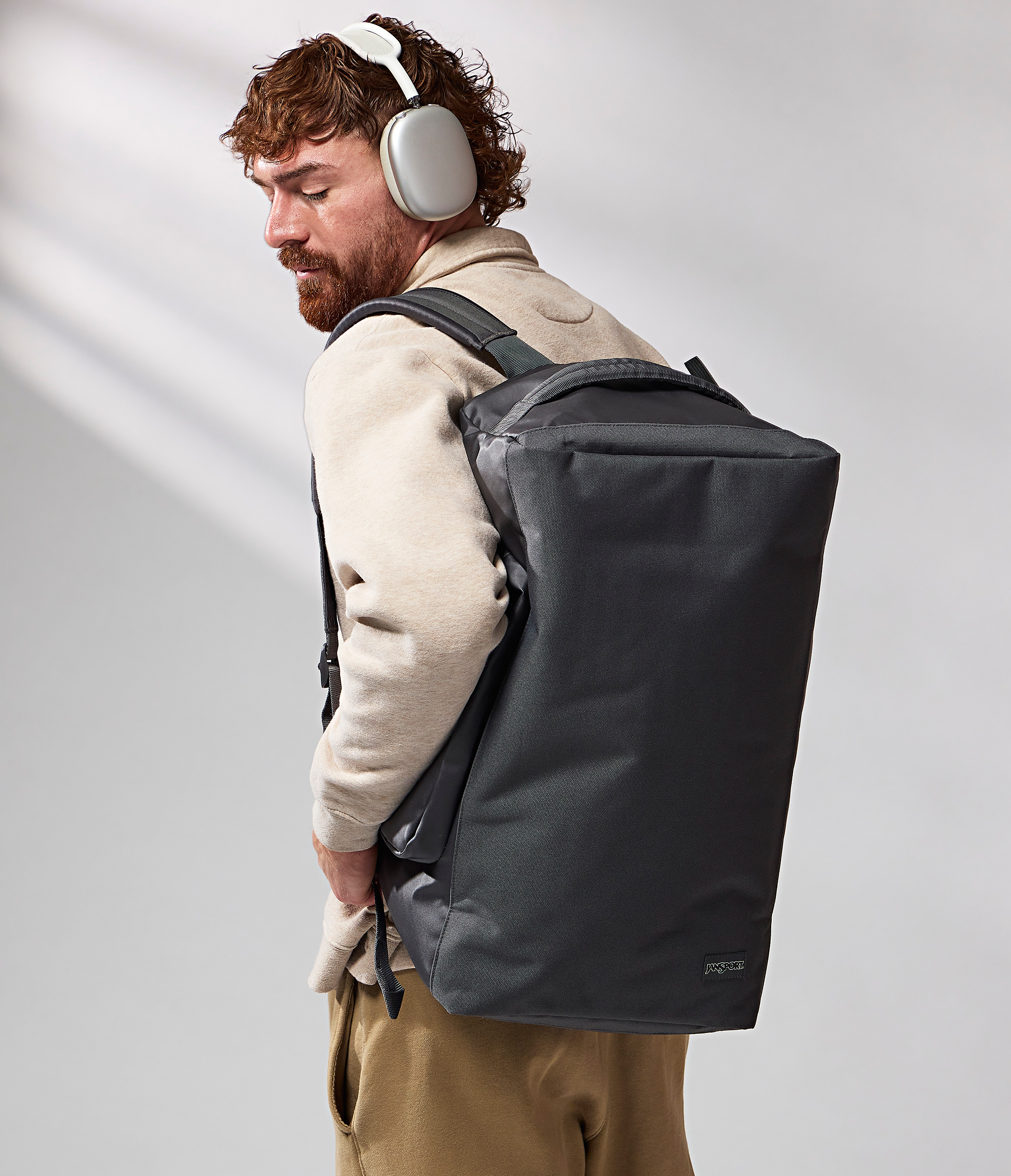 JanSport Good Latitude Convertible Duffel in Smokey Grit — angle view 2