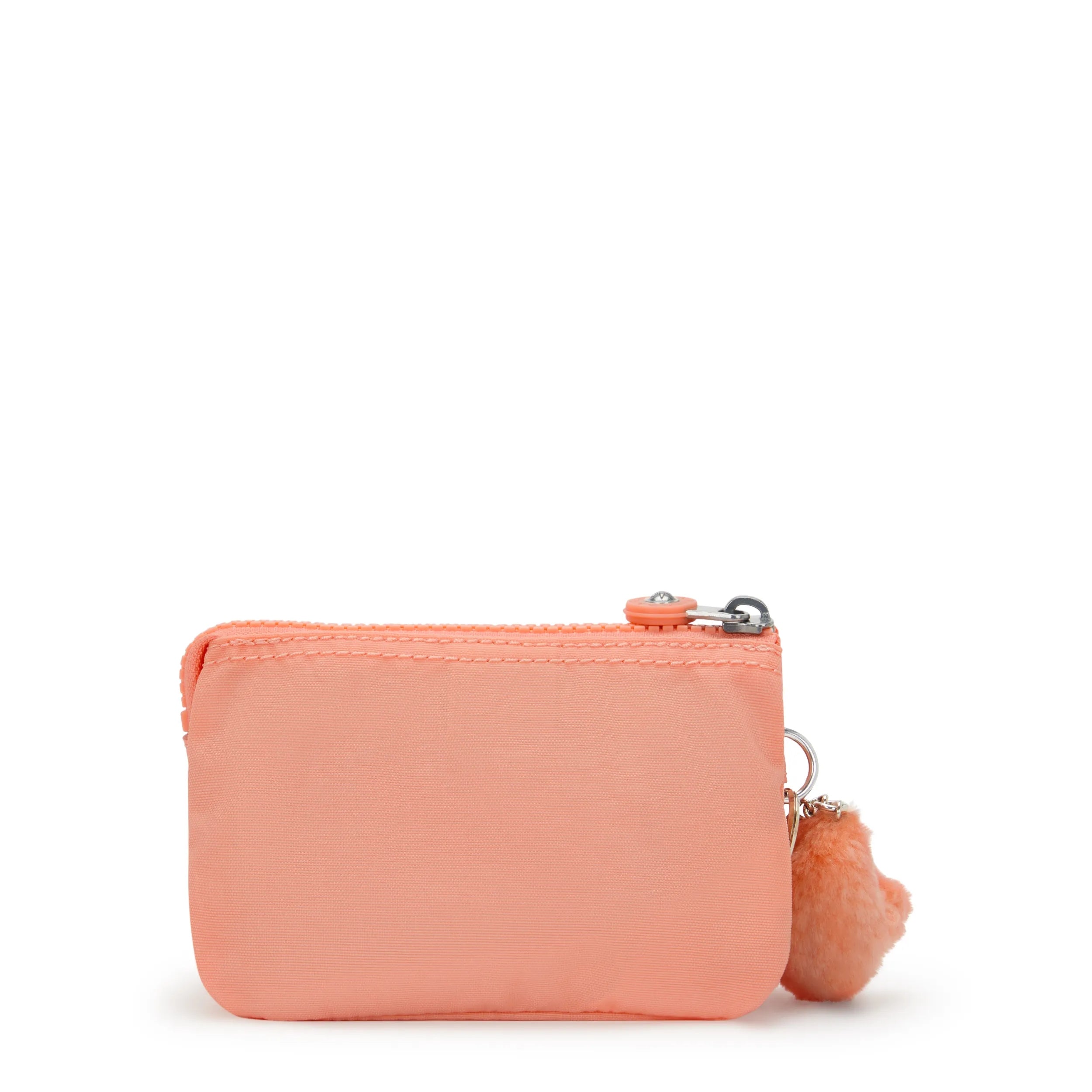 Kipling Creativity S in Pinky Orange — angle view 3