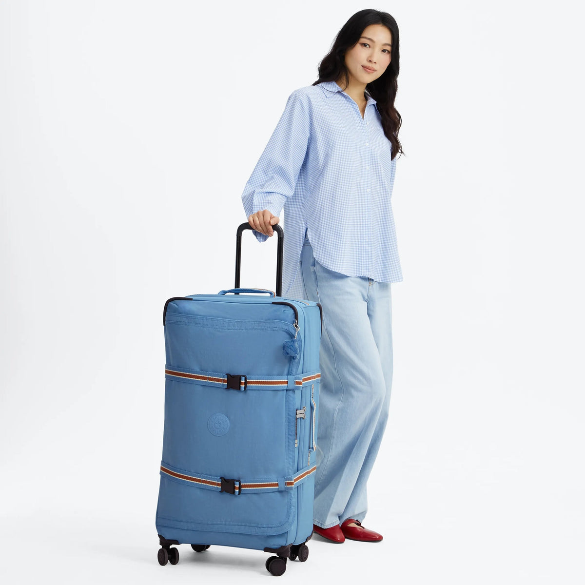 Kipling Spontaneous Large Rolling Luggage in Vintage Blue — lifestyle