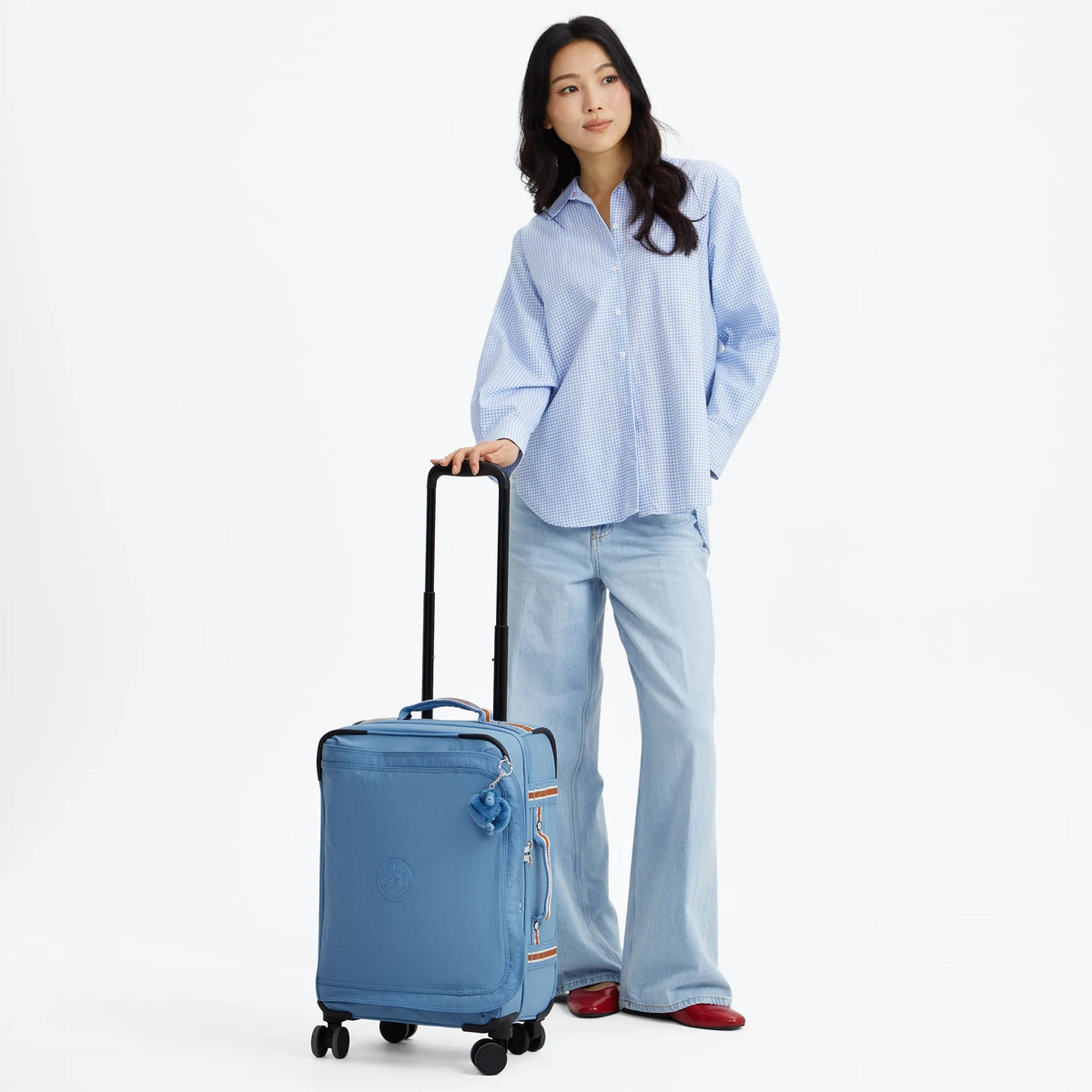 Kipling Spontaneous Small  Rolling Luggage-Carry On in Vintage Blue — lifestyle