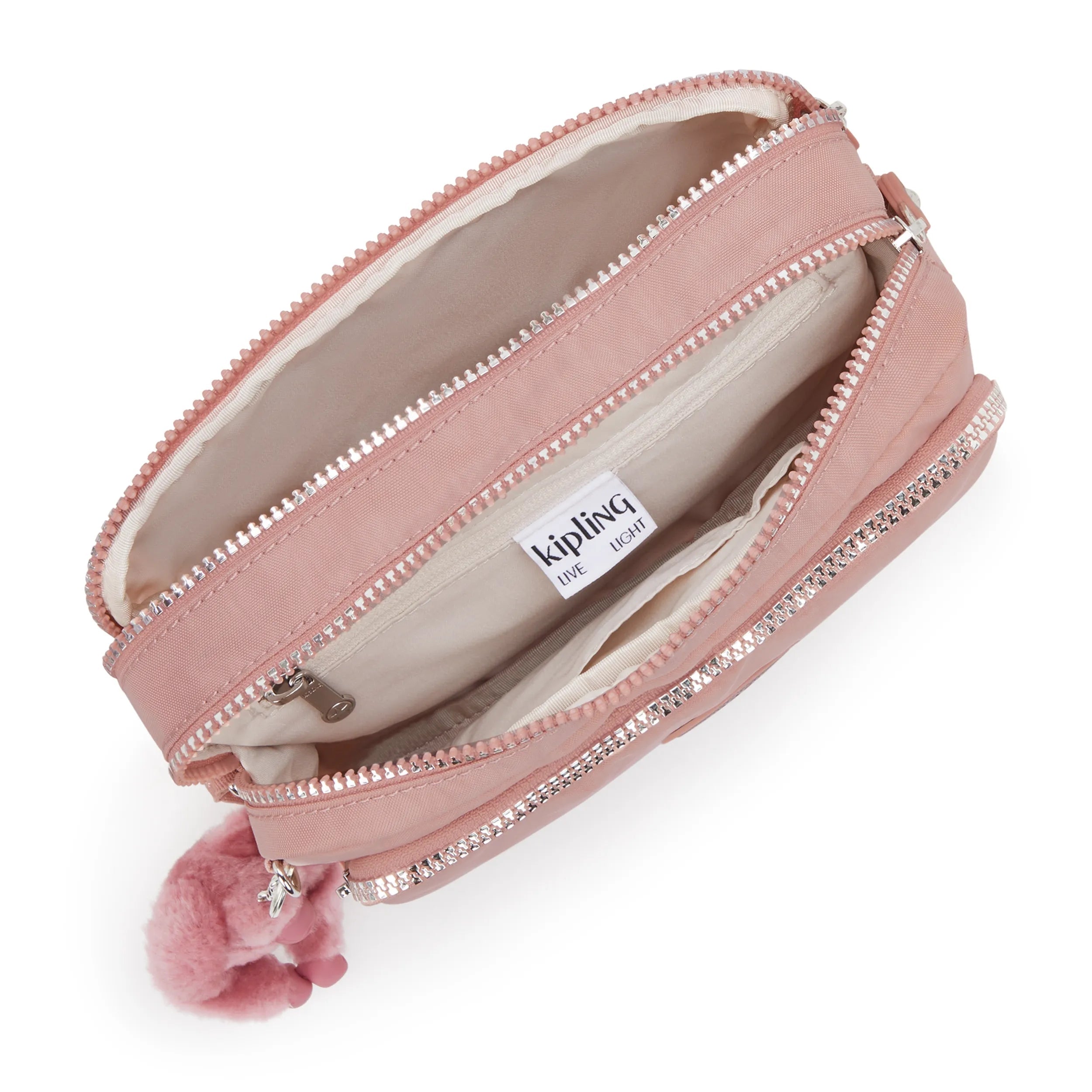 Kipling Abanu M Zip in Glorious Pink — angle view 3