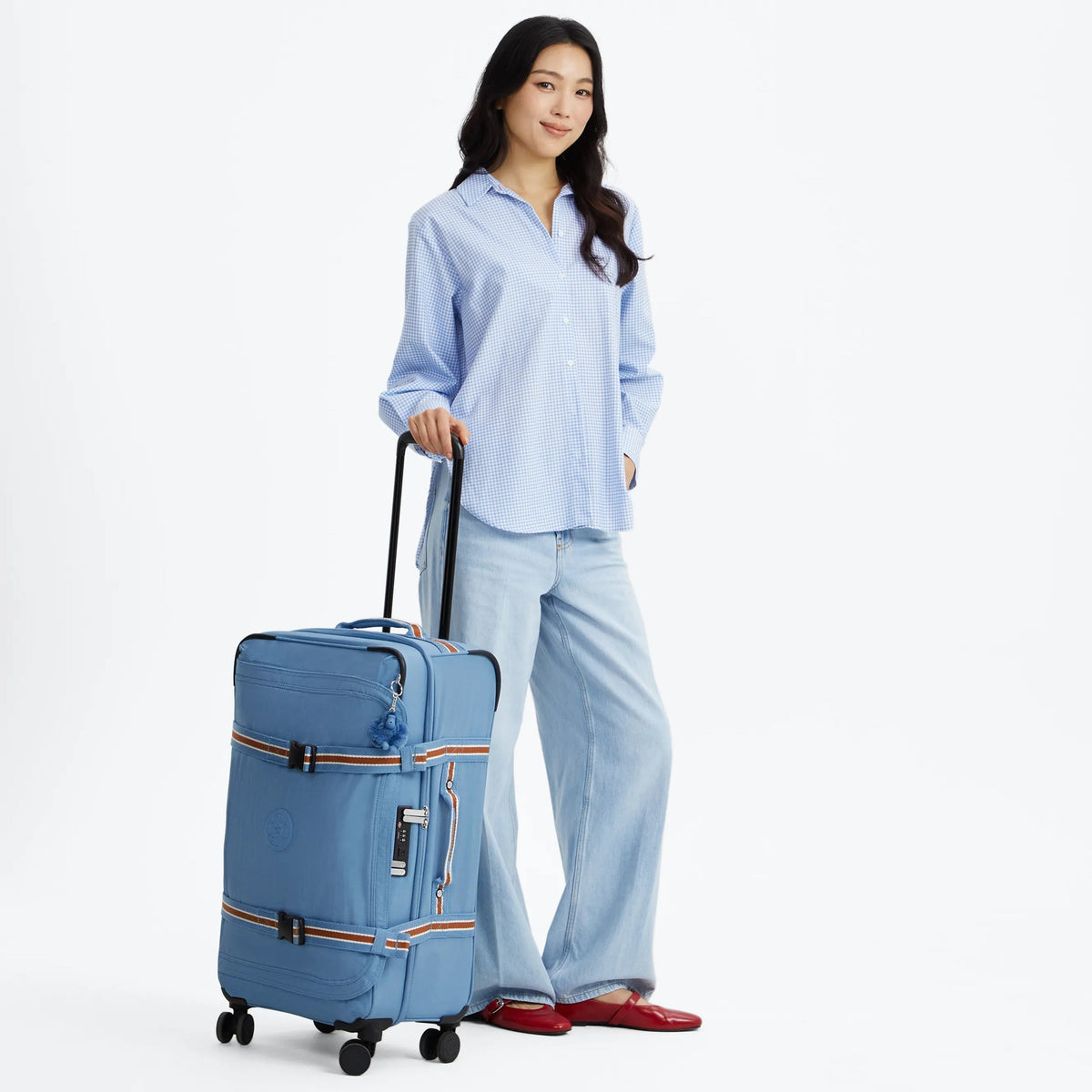 Kipling Spontaneous Medium Rolling Luggage in Vintage Blue — lifestyle