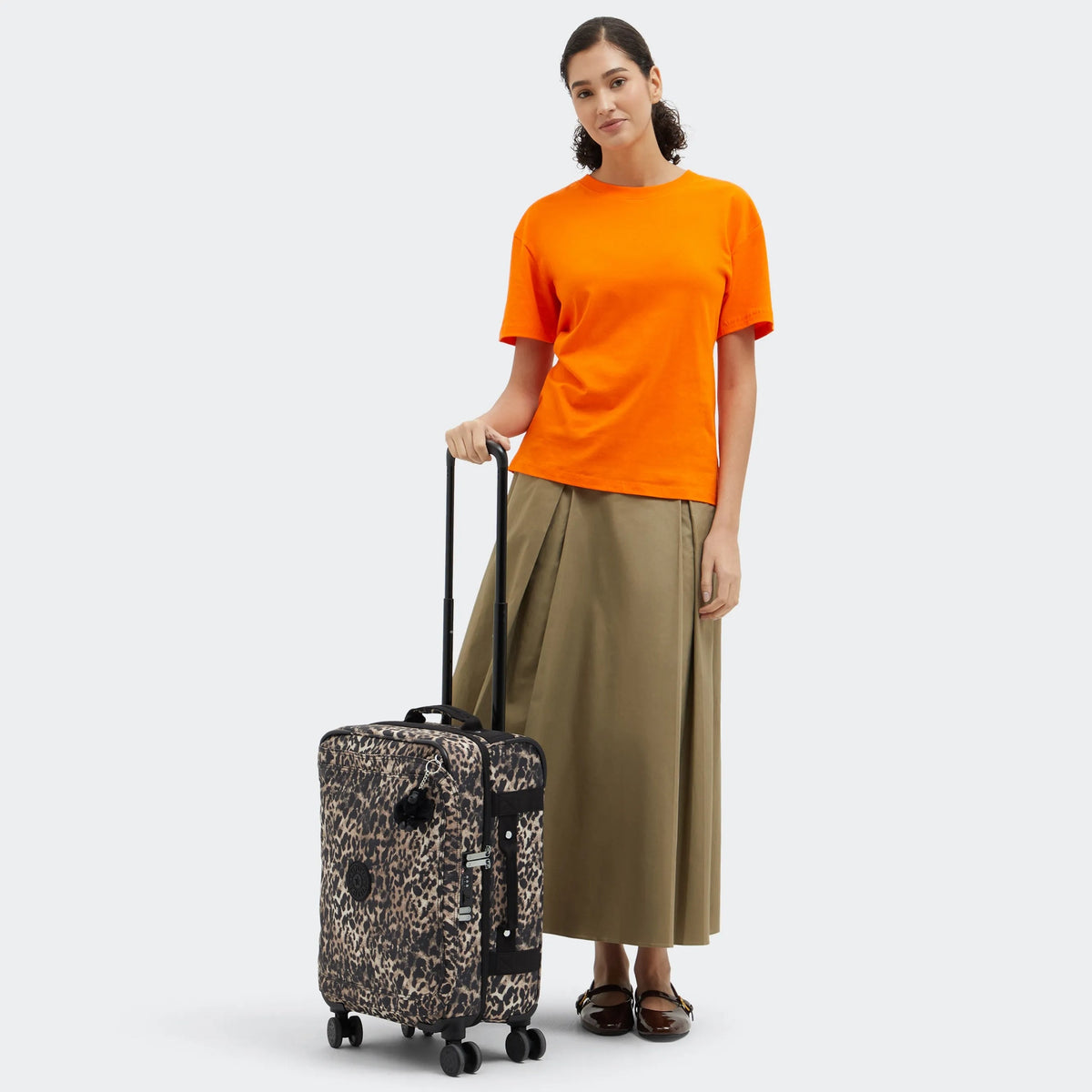 Kipling Spontaneous Small  Rolling Luggage-Carry On in Wild Leopard — lifestyle