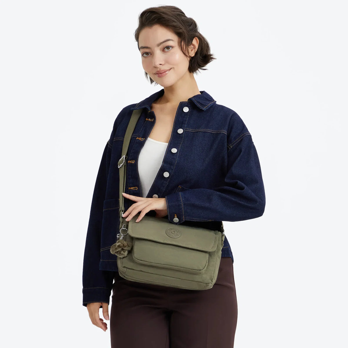 Kipling Dalma Medium Crossbody in Almost Sage — lifestyle