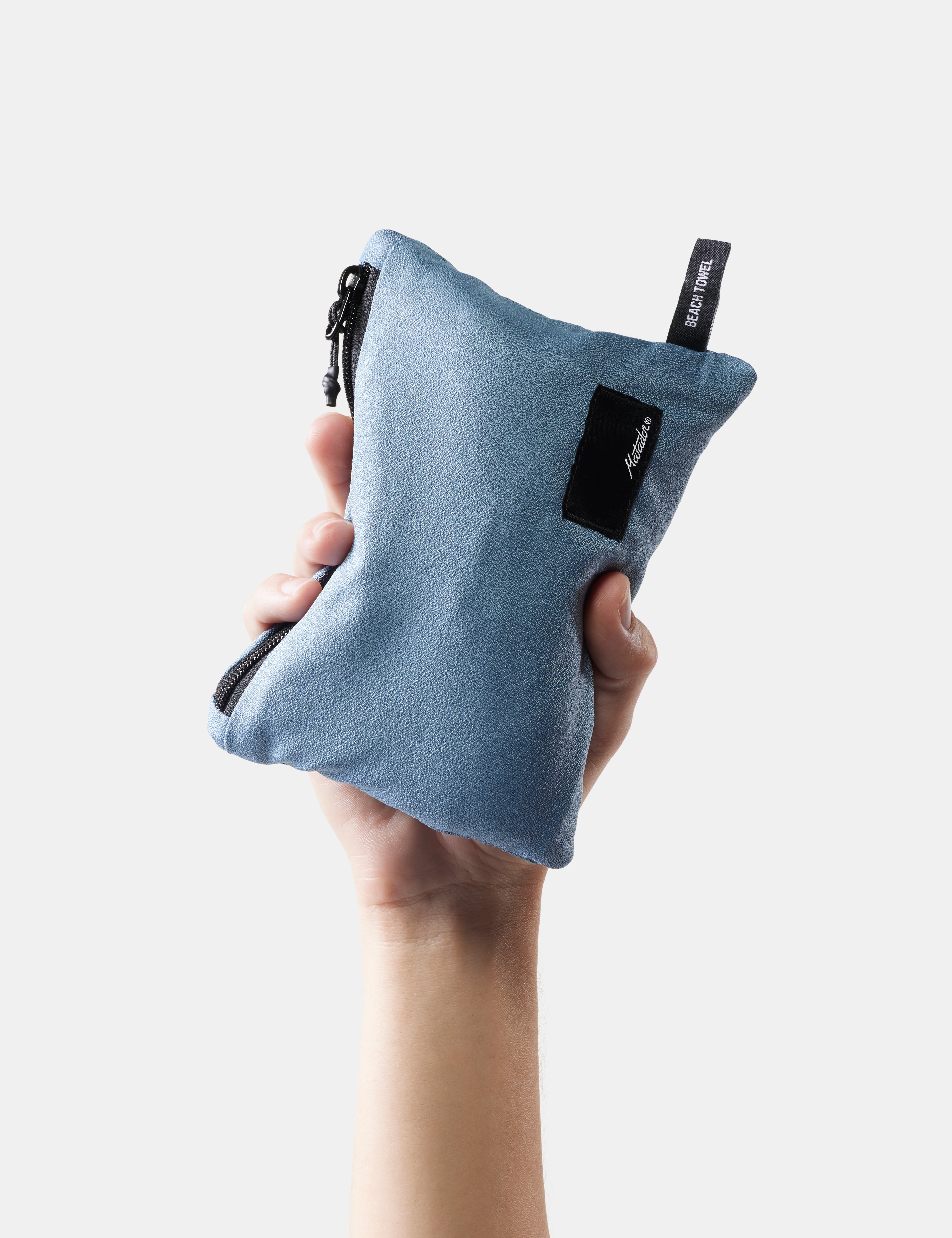 Matador NanoDry Packable Beach Towel in Slate Blue — lifestyle