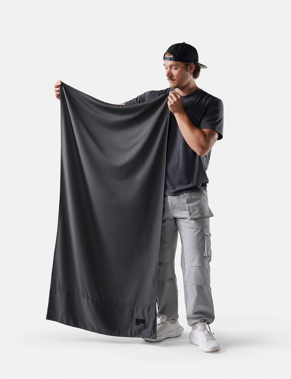 Matador NanoDry Packable Beach Towel in Charcoal — angle view 2