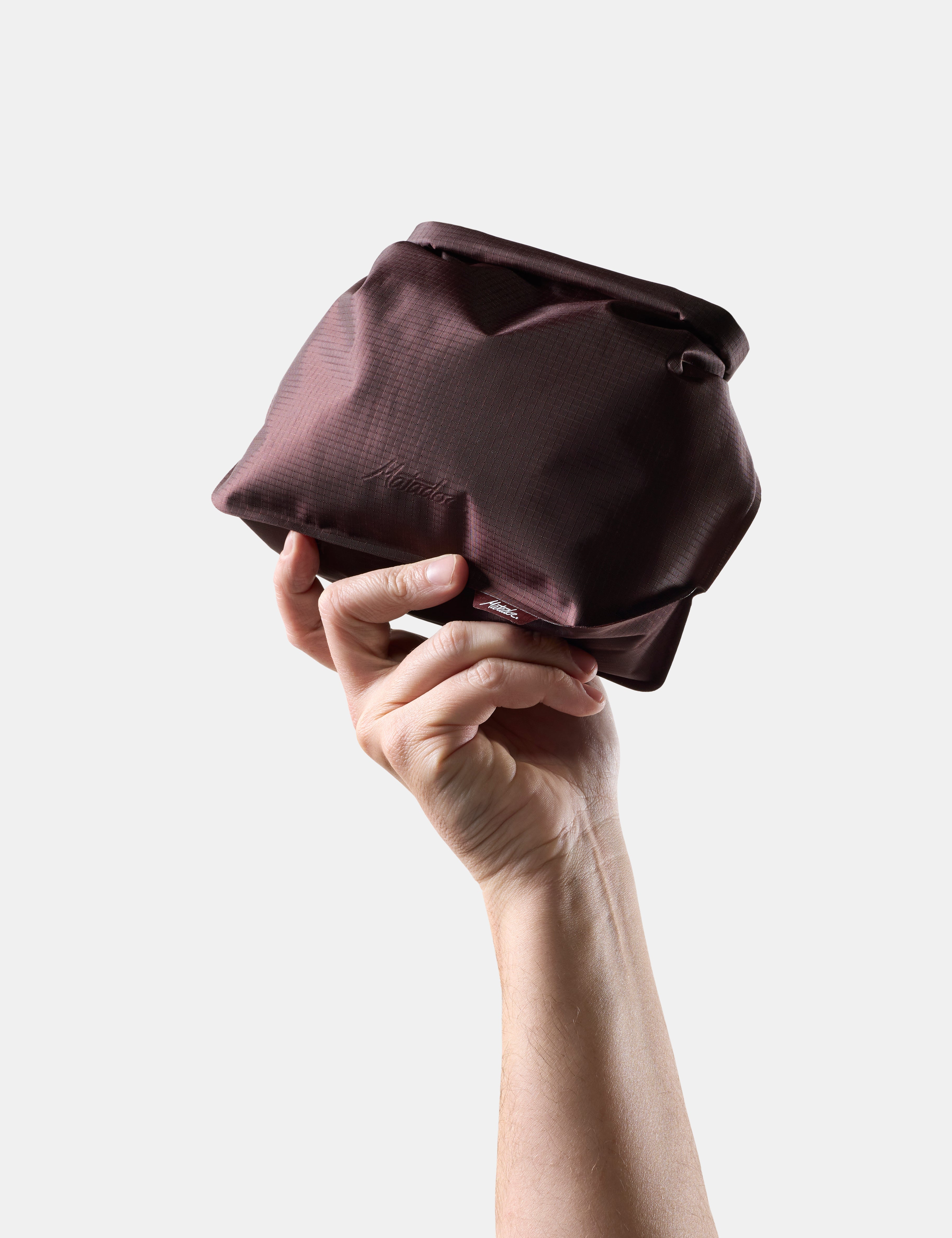 Matador FlatPak Waterproof Toiletry Case in Garnet — angle view 2 # color_Garnet
