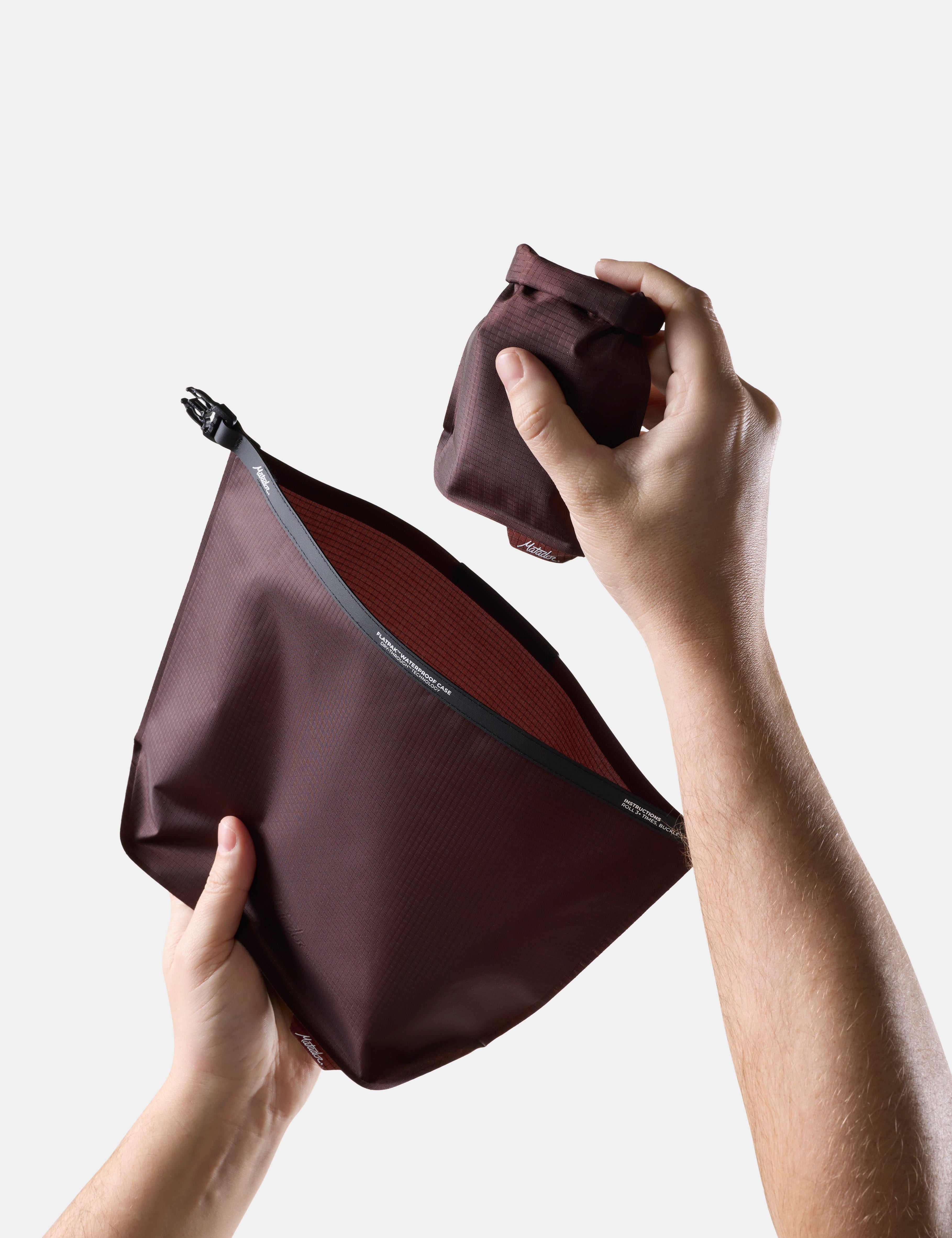 Matador FlatPak Waterproof Toiletry Case in Garnet — lifestyle # color_Garnet