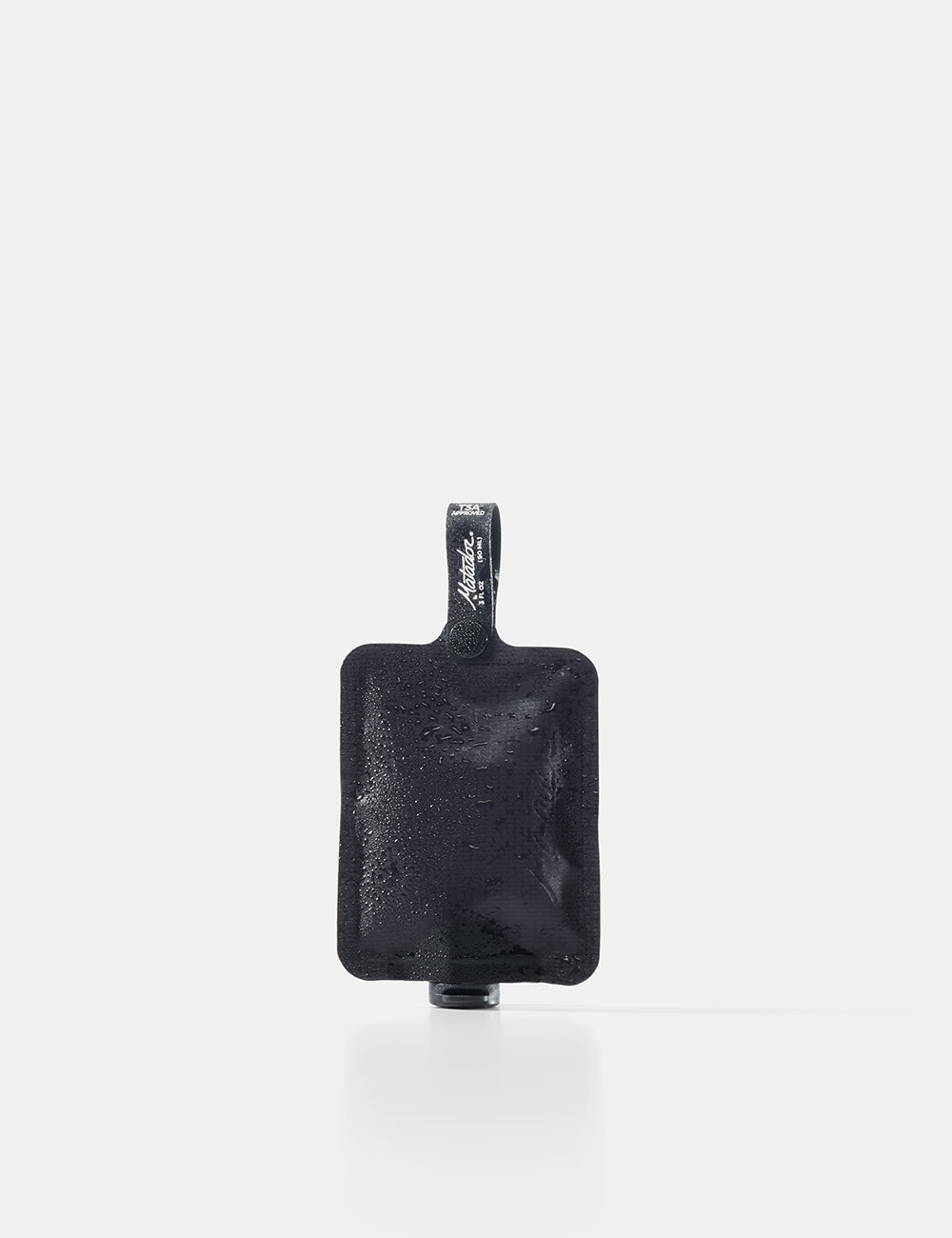 Matador FlatPak Toiletry Bottle in Charcoal — front view