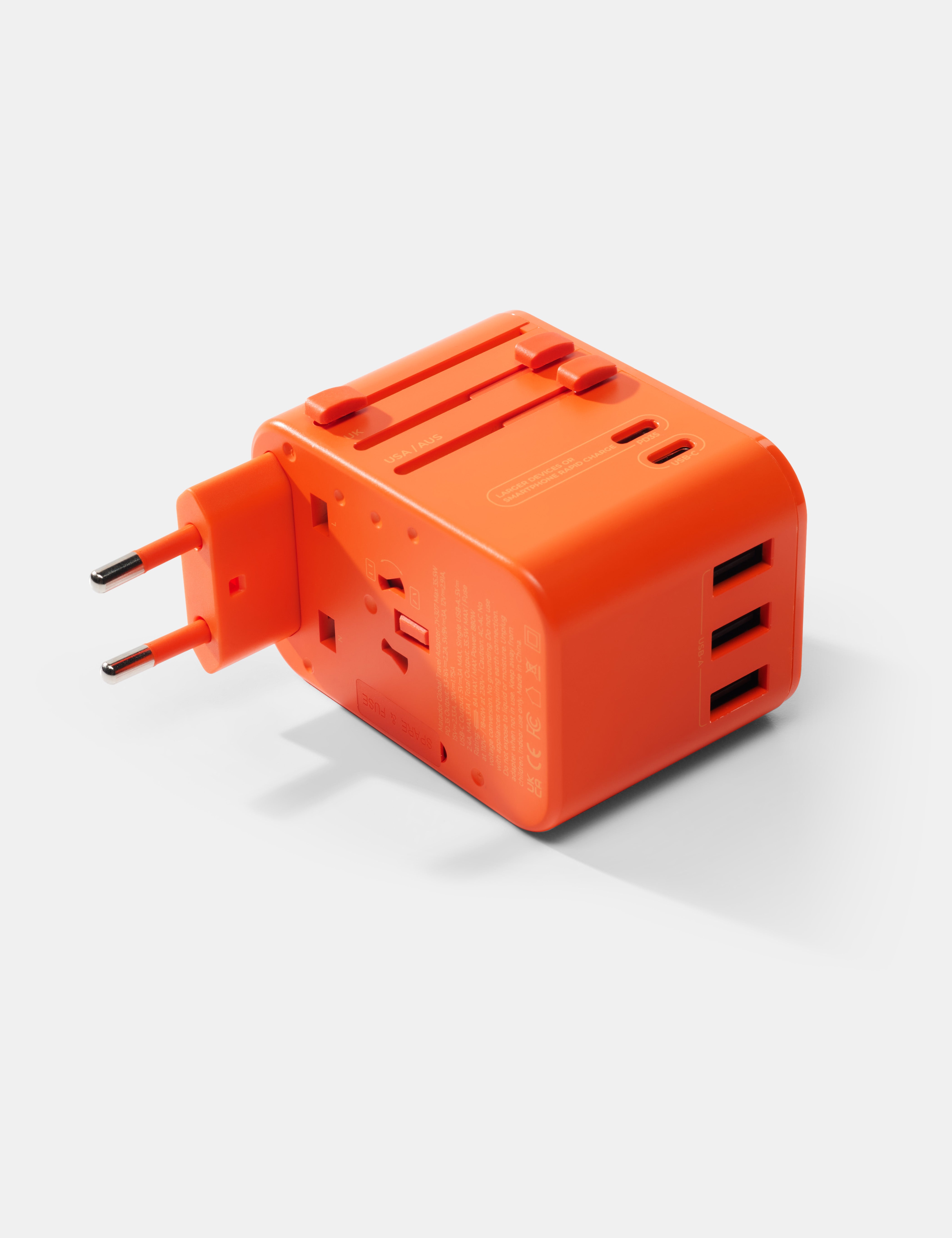 Matador Global Travel Adapter in Orange — angle view 4