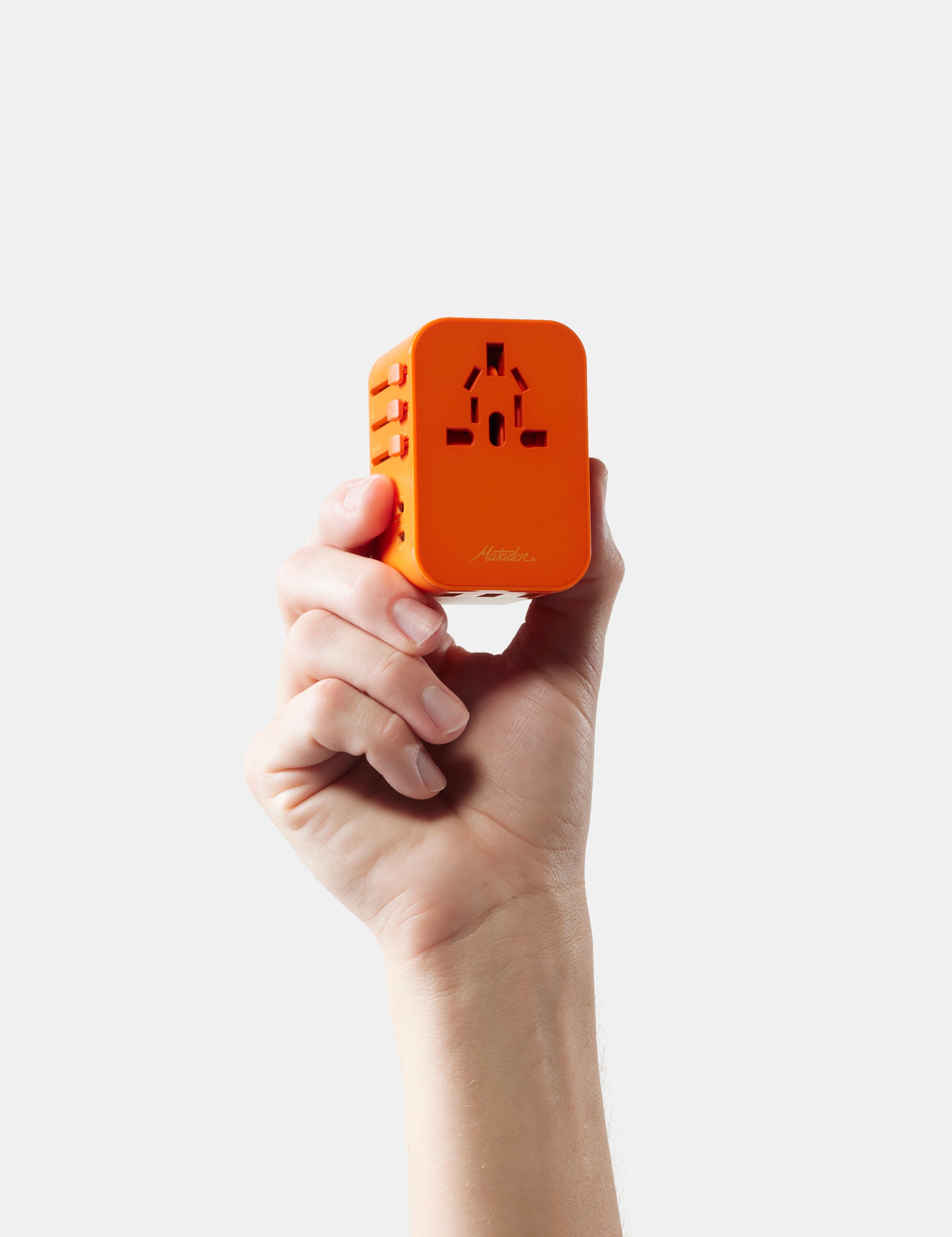 Matador Global Travel Adapter in Orange — angle view 2
