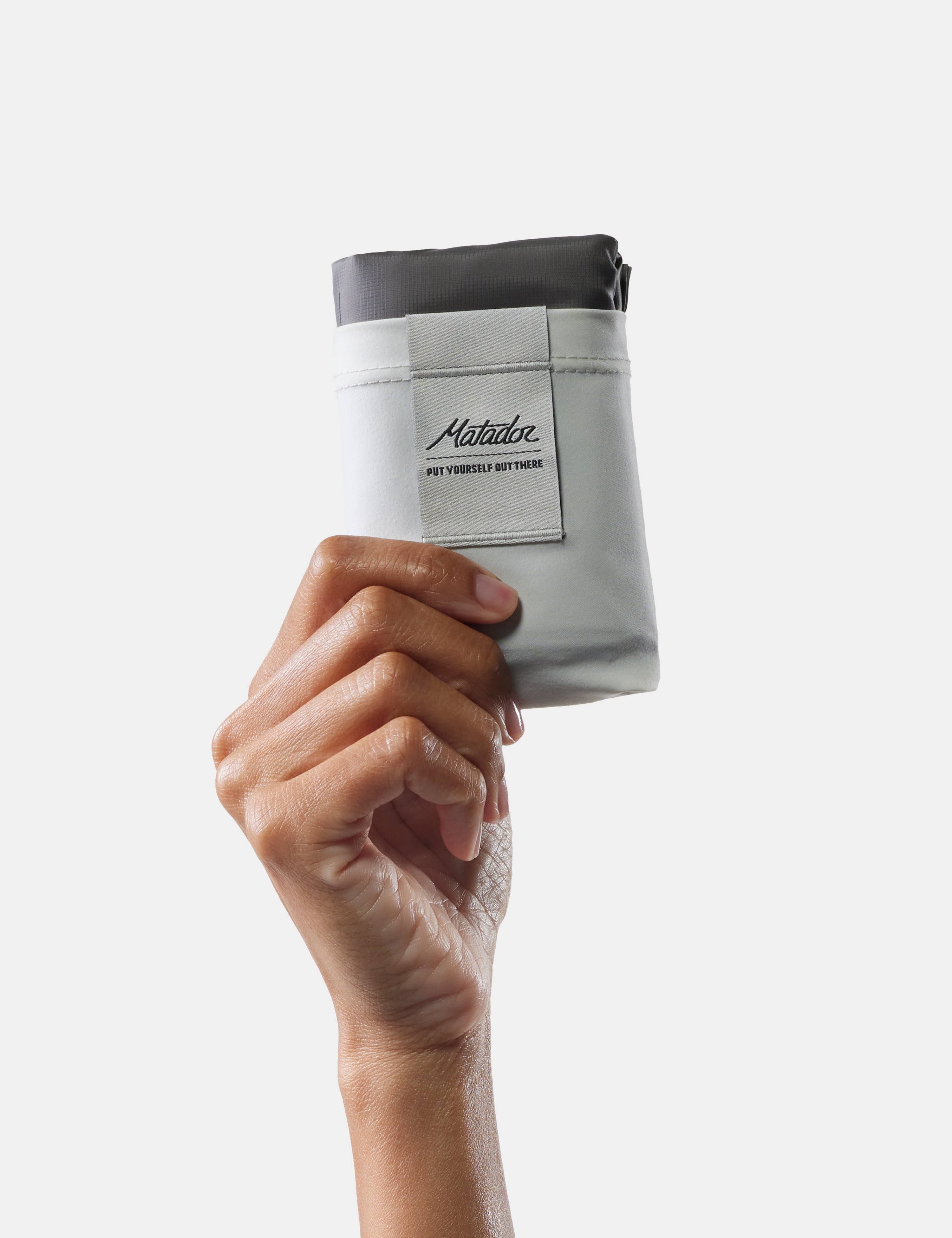 Matador Pocket Blanket in Arctic White — back view