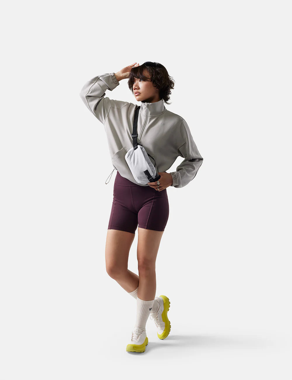 Matador ReFraction Packable Sling in Arctic White — lifestyle # color_Arctic White