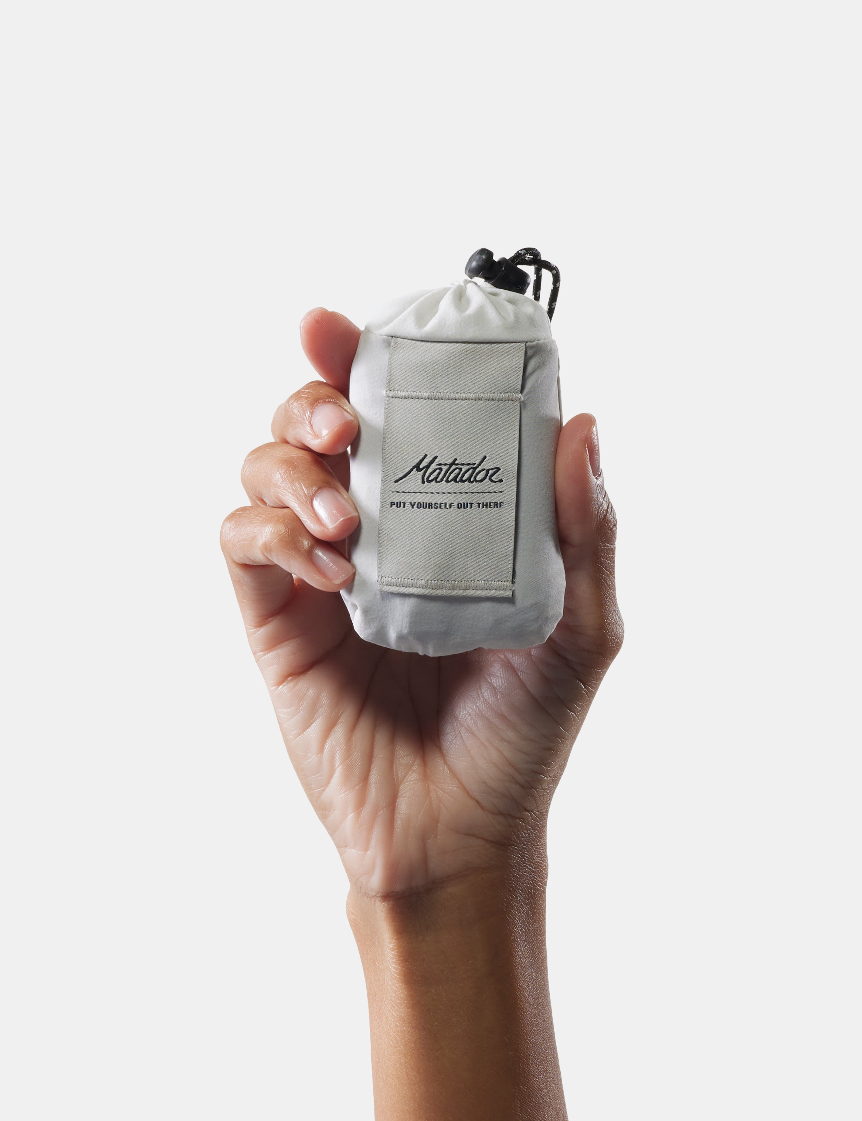 Matador Pocket Blanket Mini in Arctic White — back view