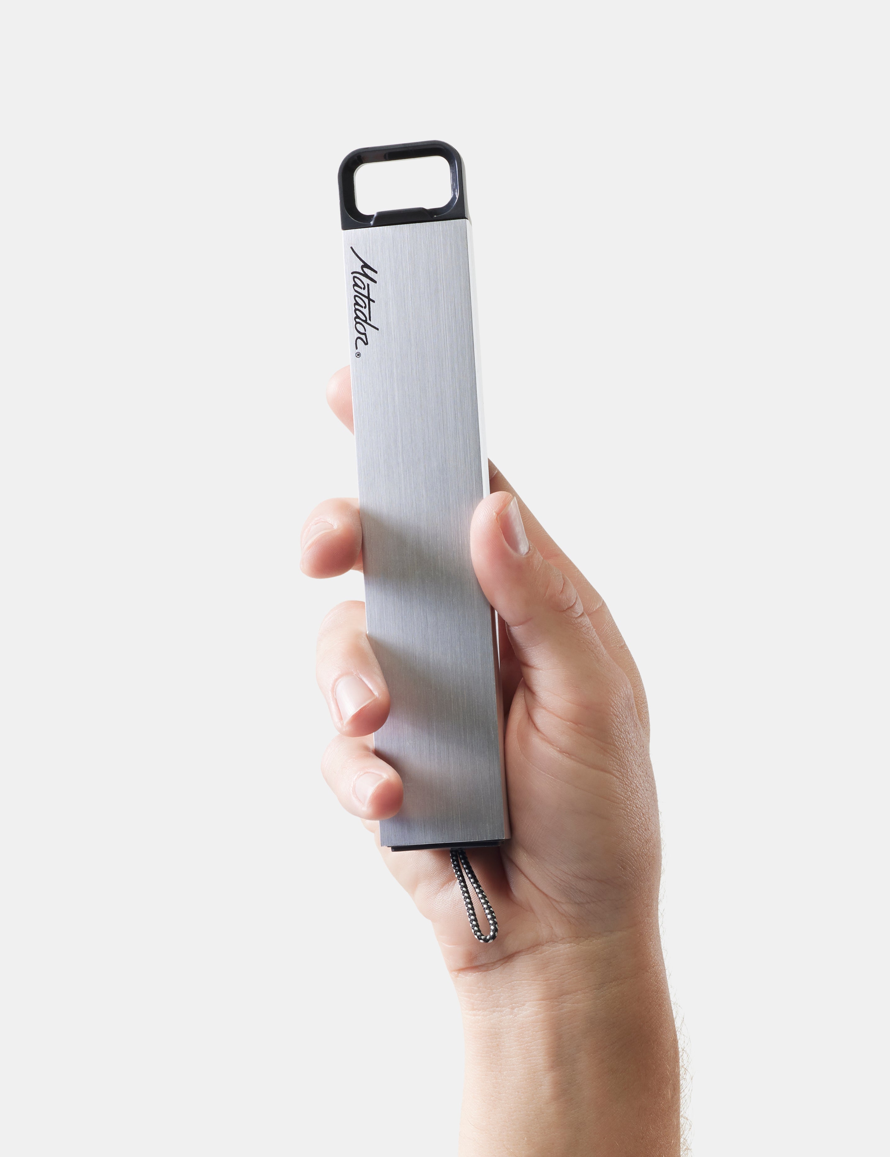 Matador Waterproof Pill Canister in Brushed Aluminum — lifestyle